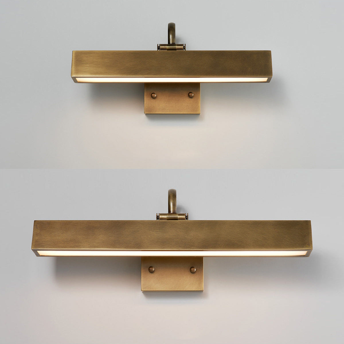 Lifestyle image of the Arti Wall Sconce in a modern living room.