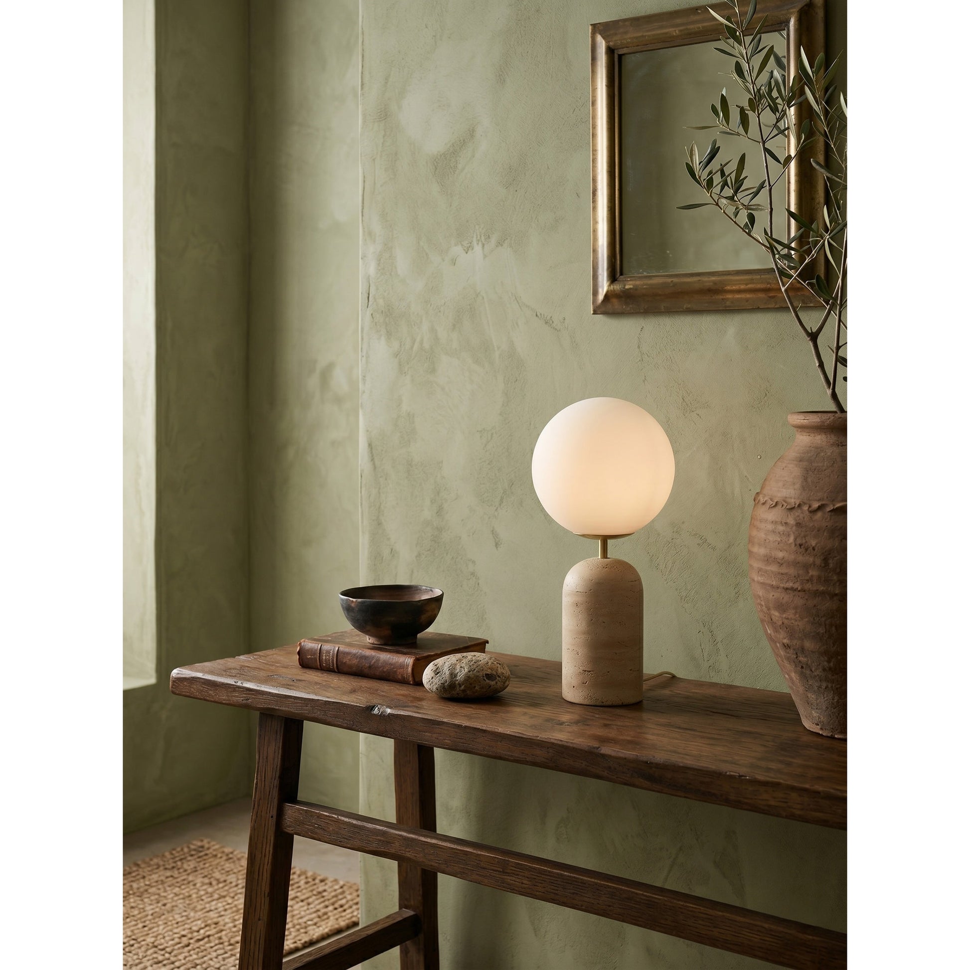 The lamp in a warm minimalist interior setting.