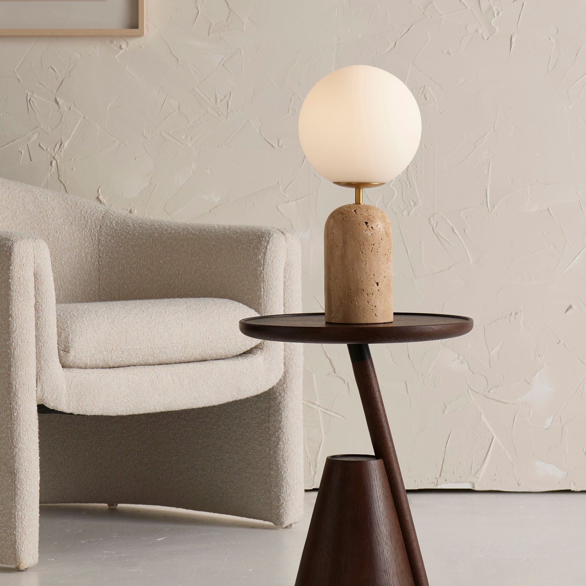 Front view of the Aseneth Table Lamp with its frosted glass globe.