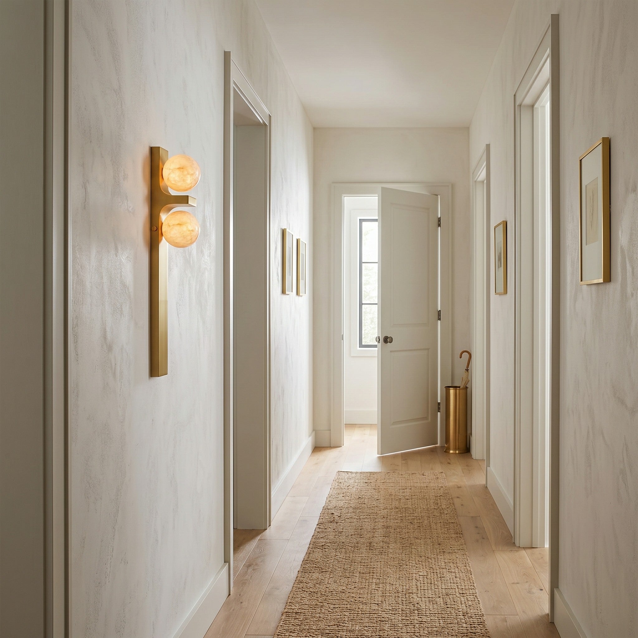 The wall sconce shown unlit to emphasize the natural beauty of the alabaster stone.