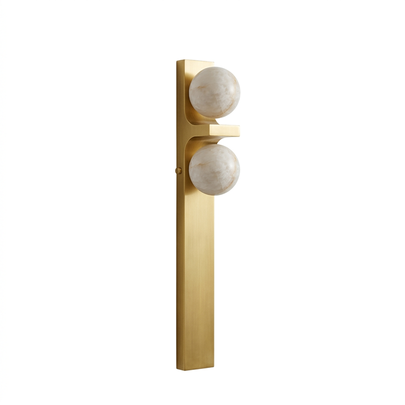 The wall sconce against a dark-colored wall for a high-contrast look.