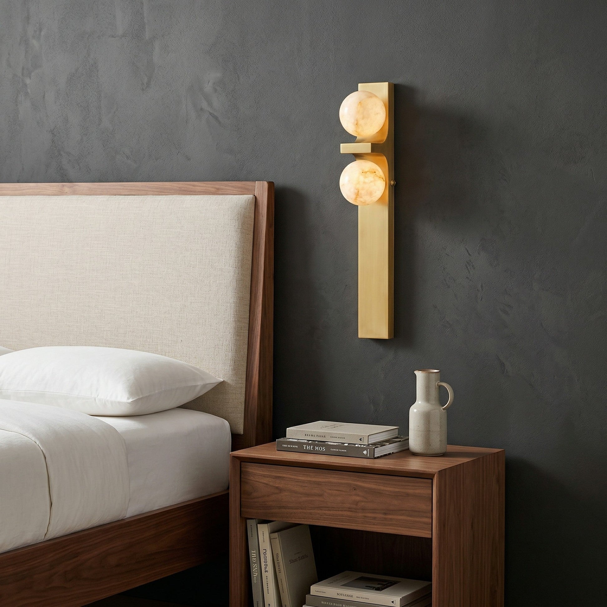 Close-up of the two natural alabaster globe shades, highlighting their unique veining.