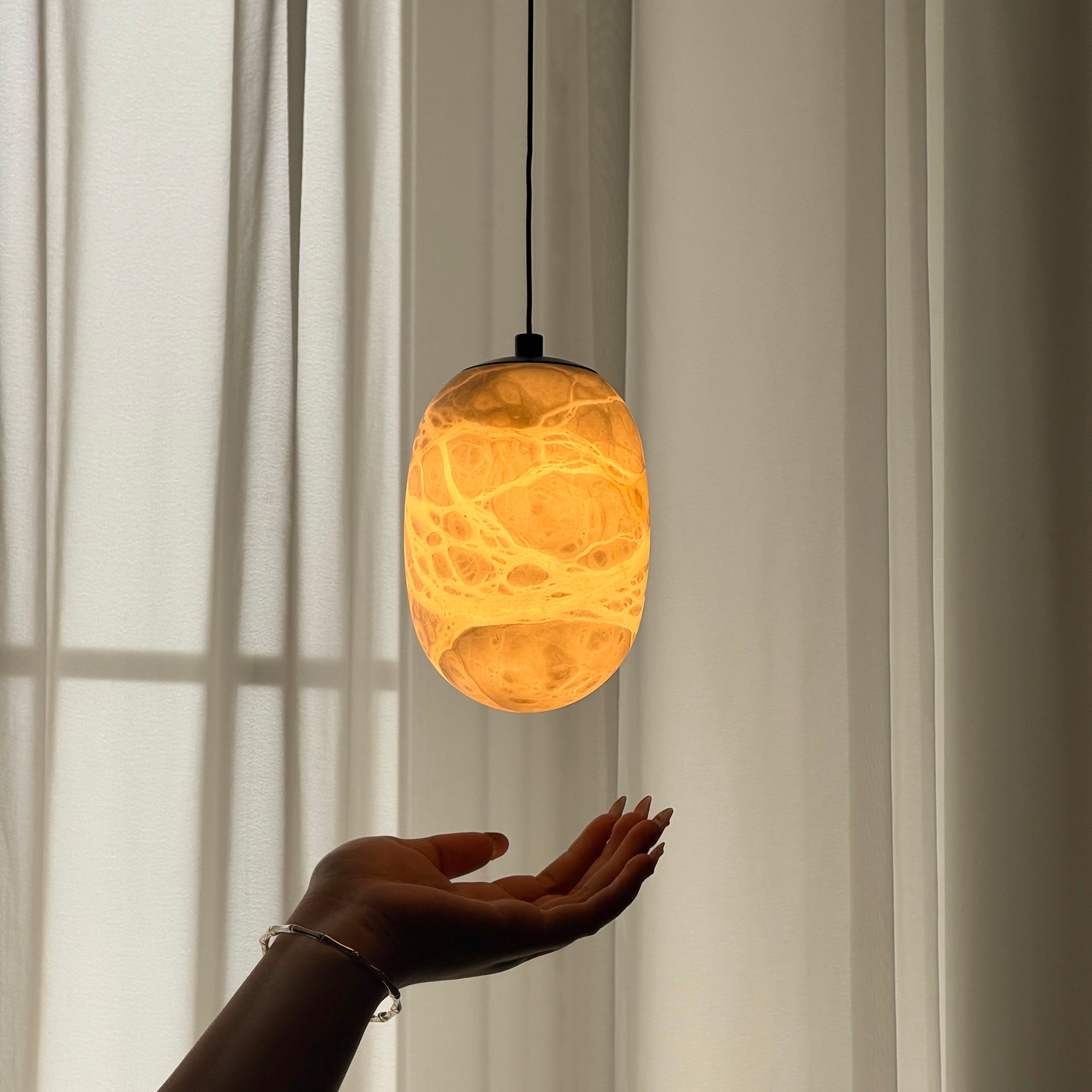 Lifestyle image showing the lamp in a contemporary home interior.