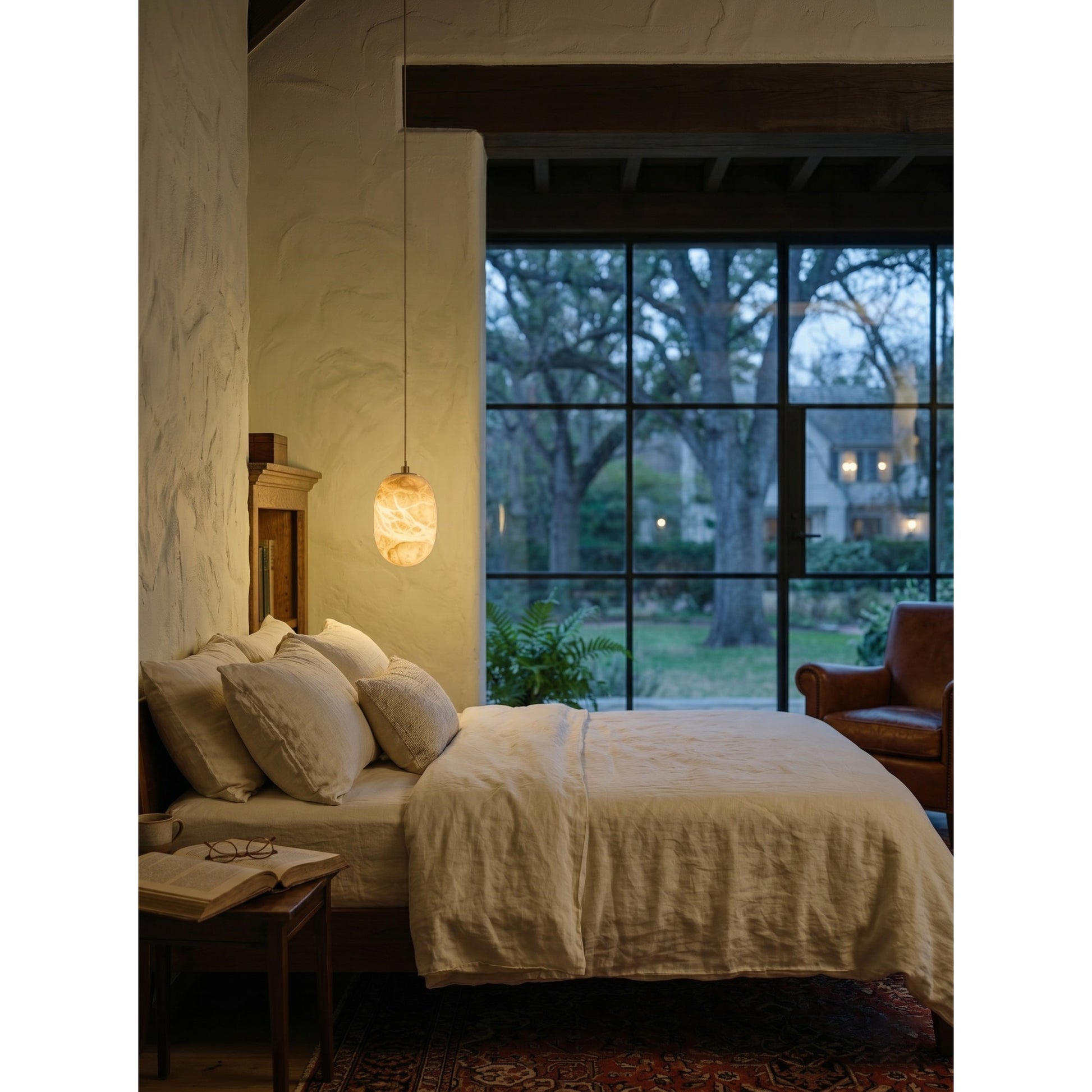 Aurora pendant lamp with its sleek black cord and hardware.
