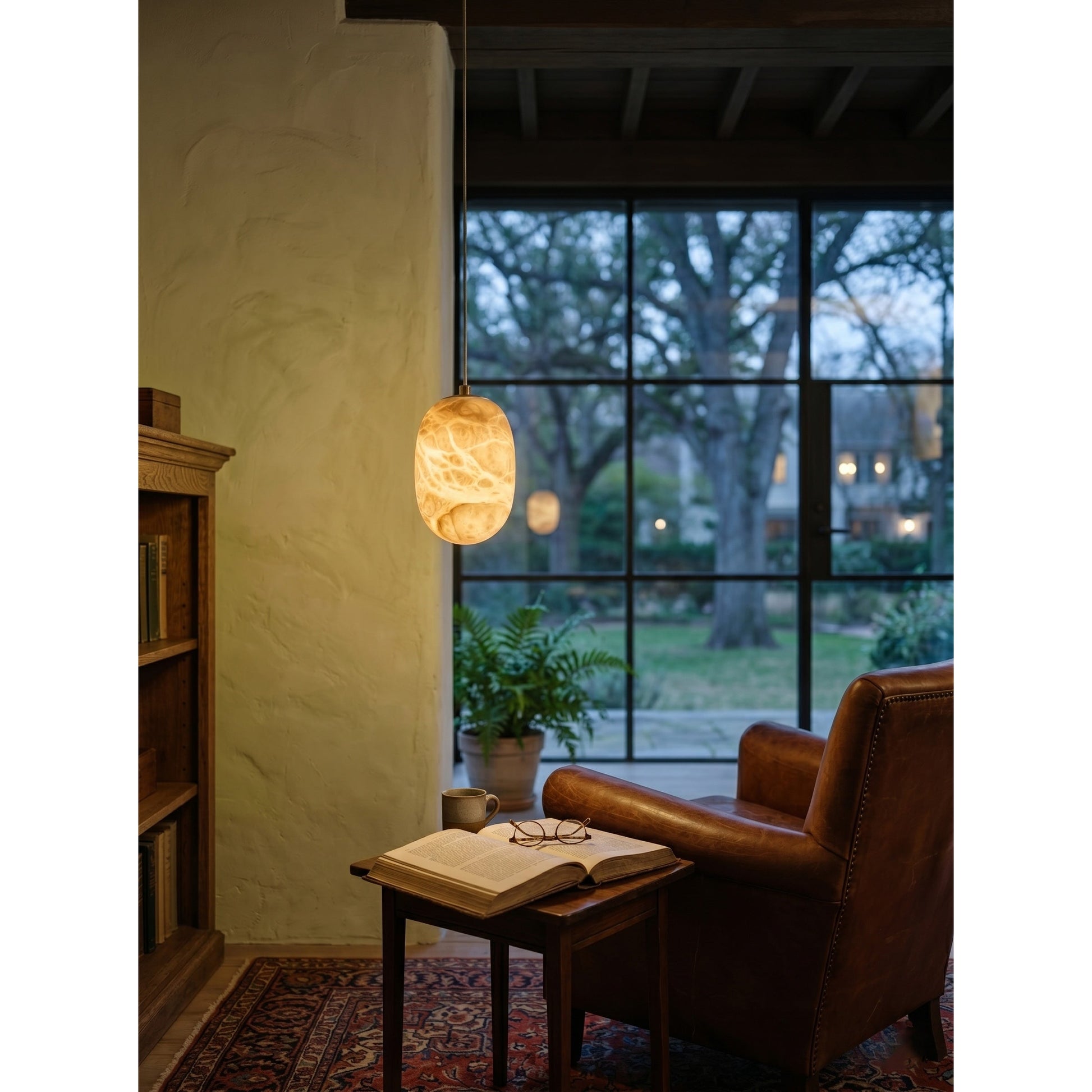 The Aurora lamp shown in a minimalist living room setting.