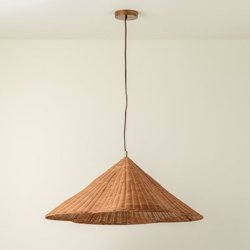 The lamp shown with the light turned on in a dark room.