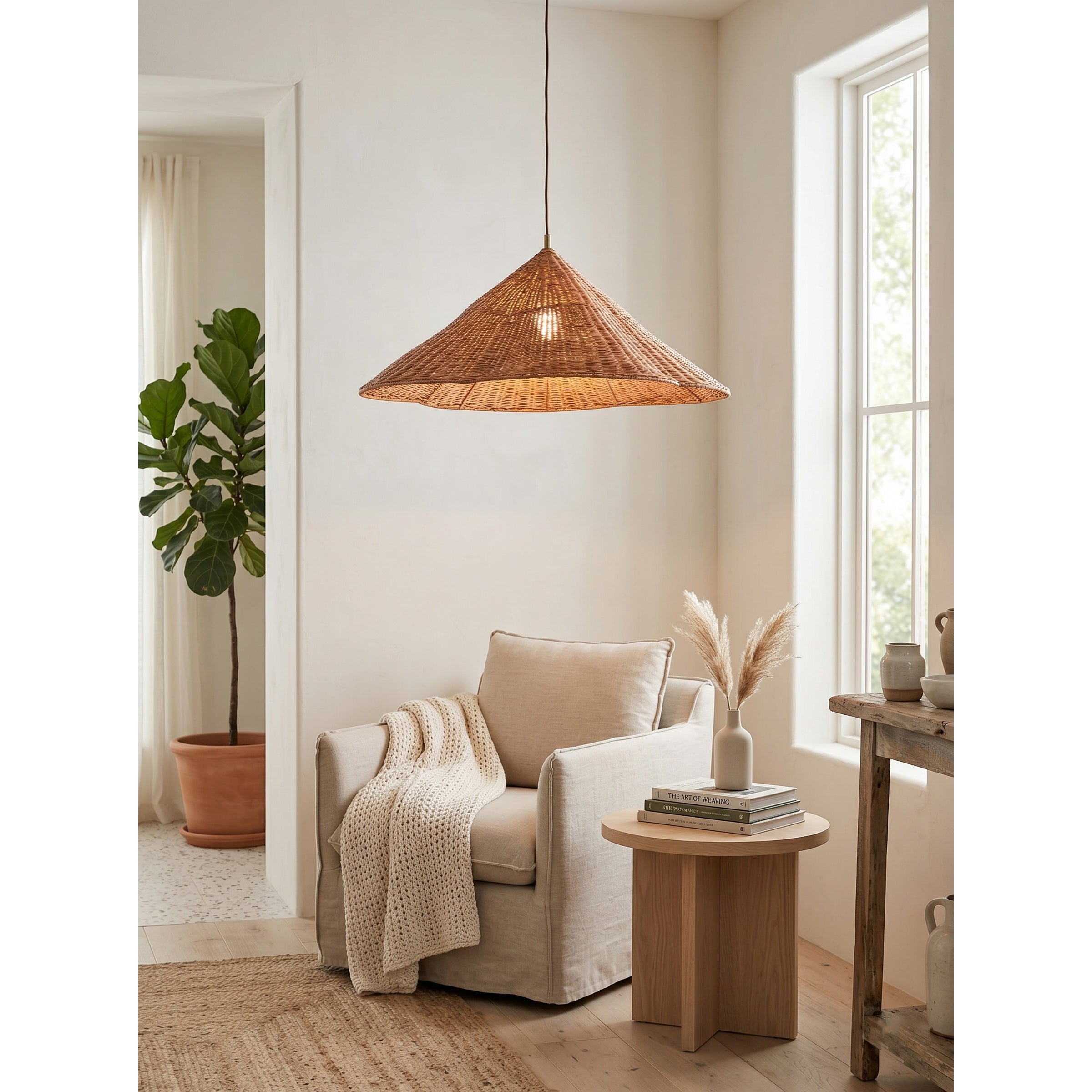 Bardi Scalloped Rattan Pendant Lamp shown in a dining room setting.