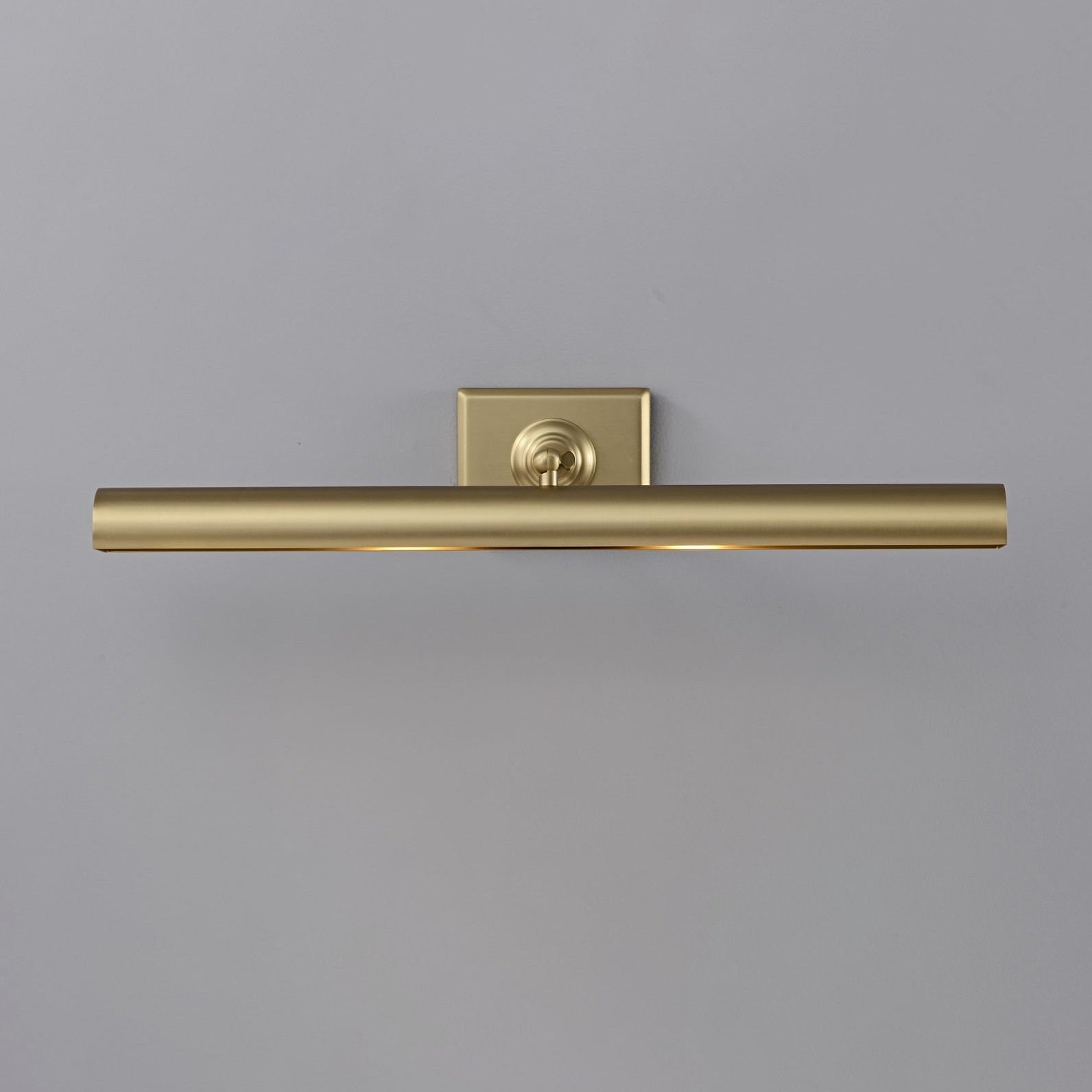 Angled view of the copper Bilbury wall sconce against a neutral wall.