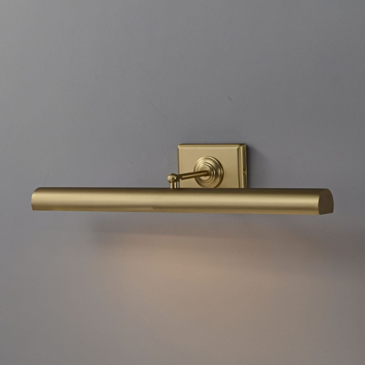 The Bilbury wall sconce folded compactly against the wall.