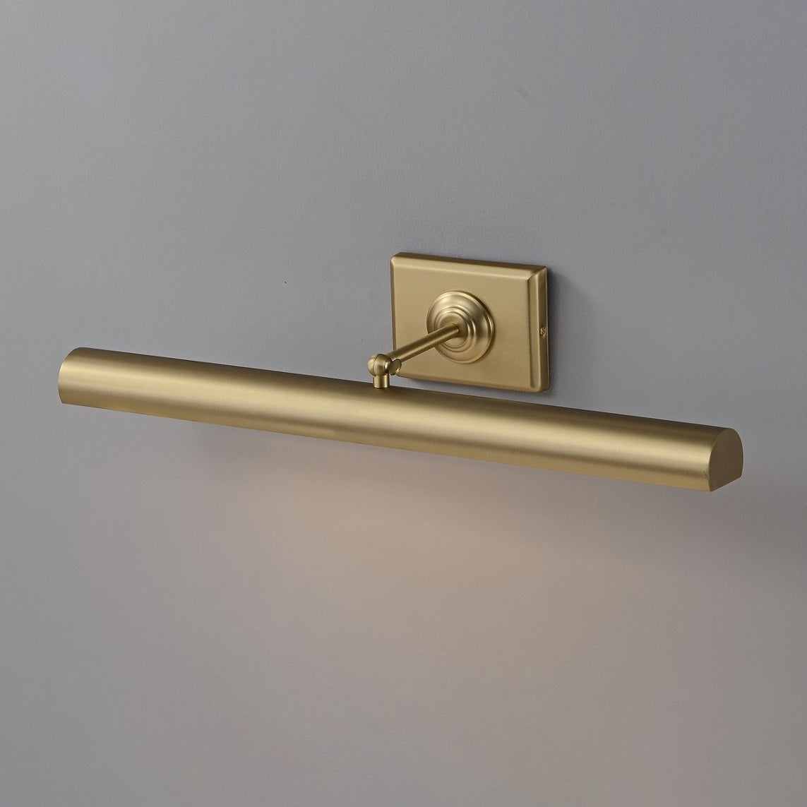 Low angle shot highlighting the sleek, transitional design of the Bilbury sconce.