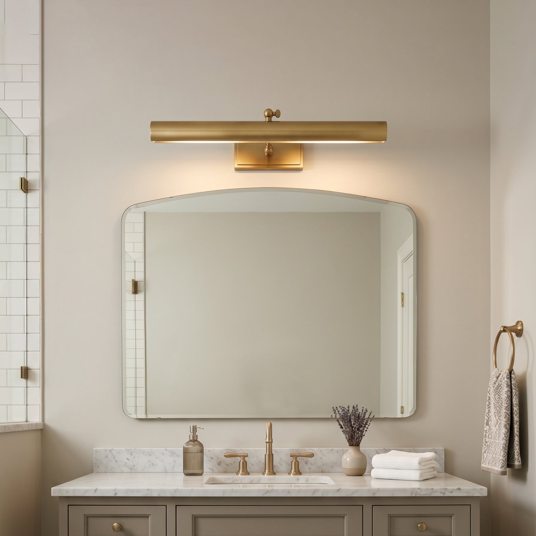 Side profile of the Bilbury wall sconce showing its adjustable arm.