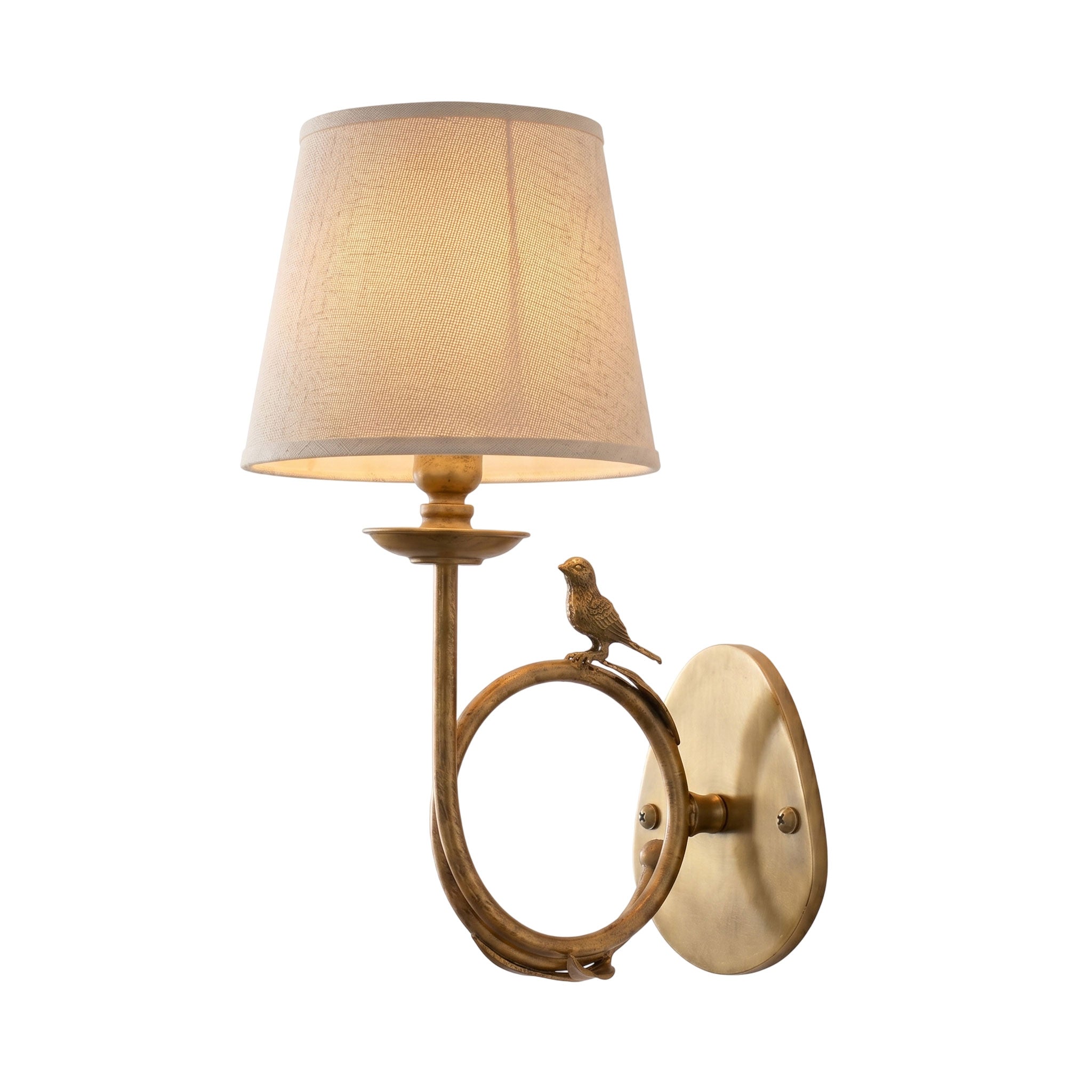 The wall sconce in a traditional dining room setting.