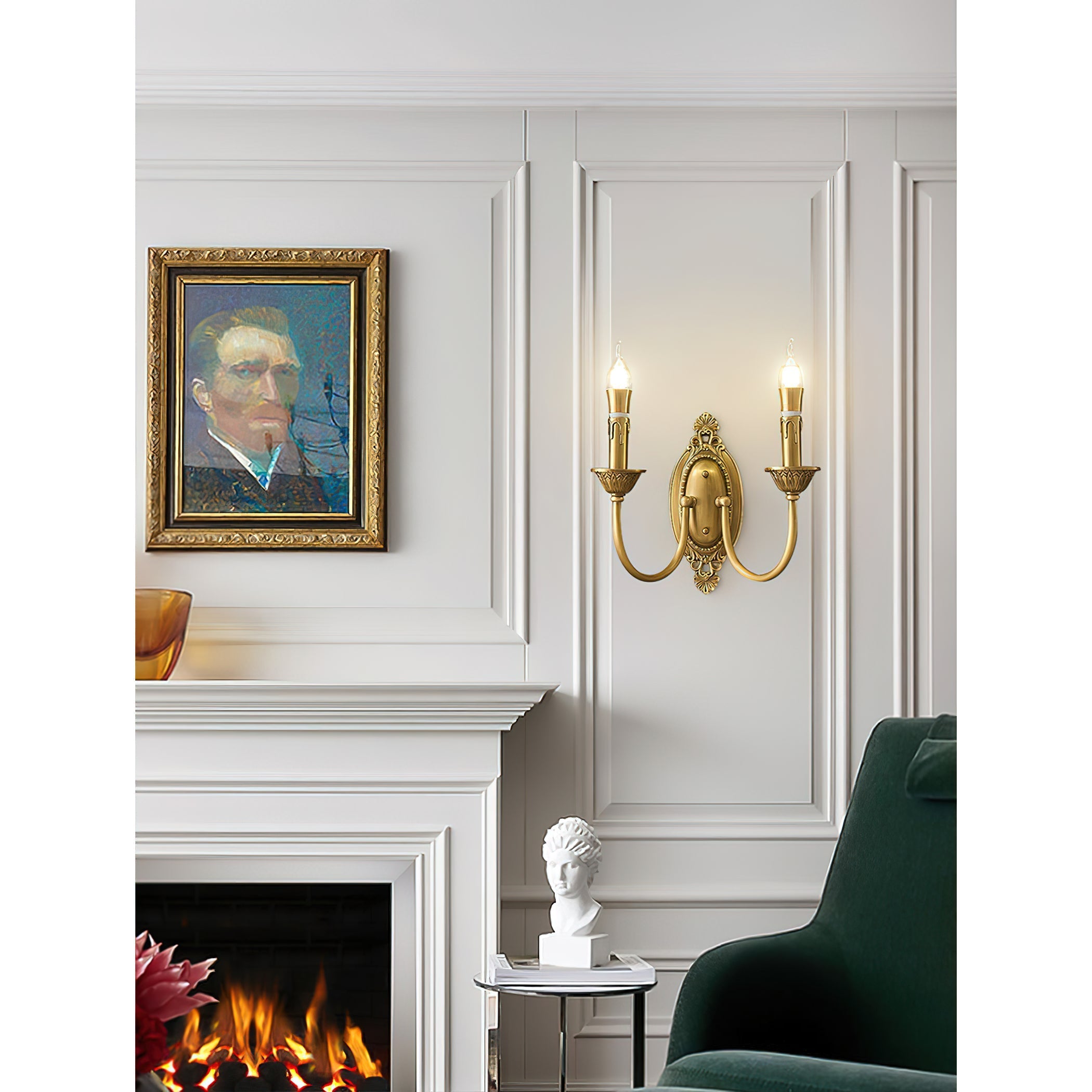 A pair of Blair Candle Wall Sconces installed on either side of a traditional fireplace.