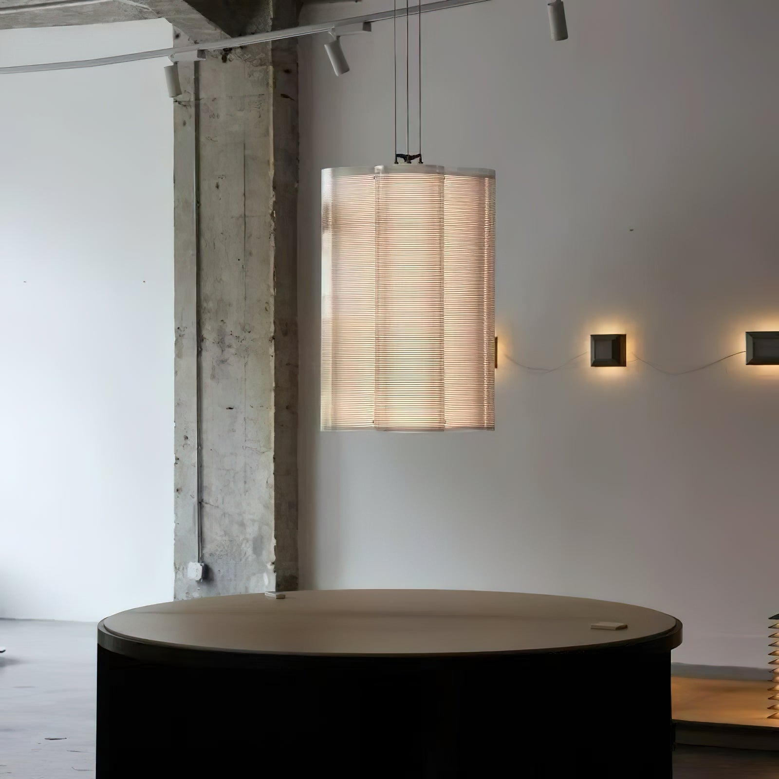 Angled view of the Bloom Chandelier highlighting the mirror-finish stainless steel.