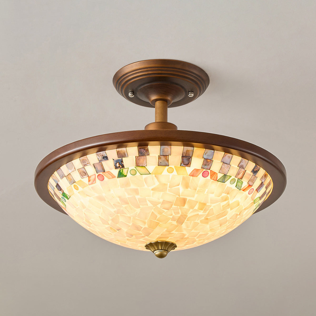 The flush mount shown unlit to display the natural texture of the materials.