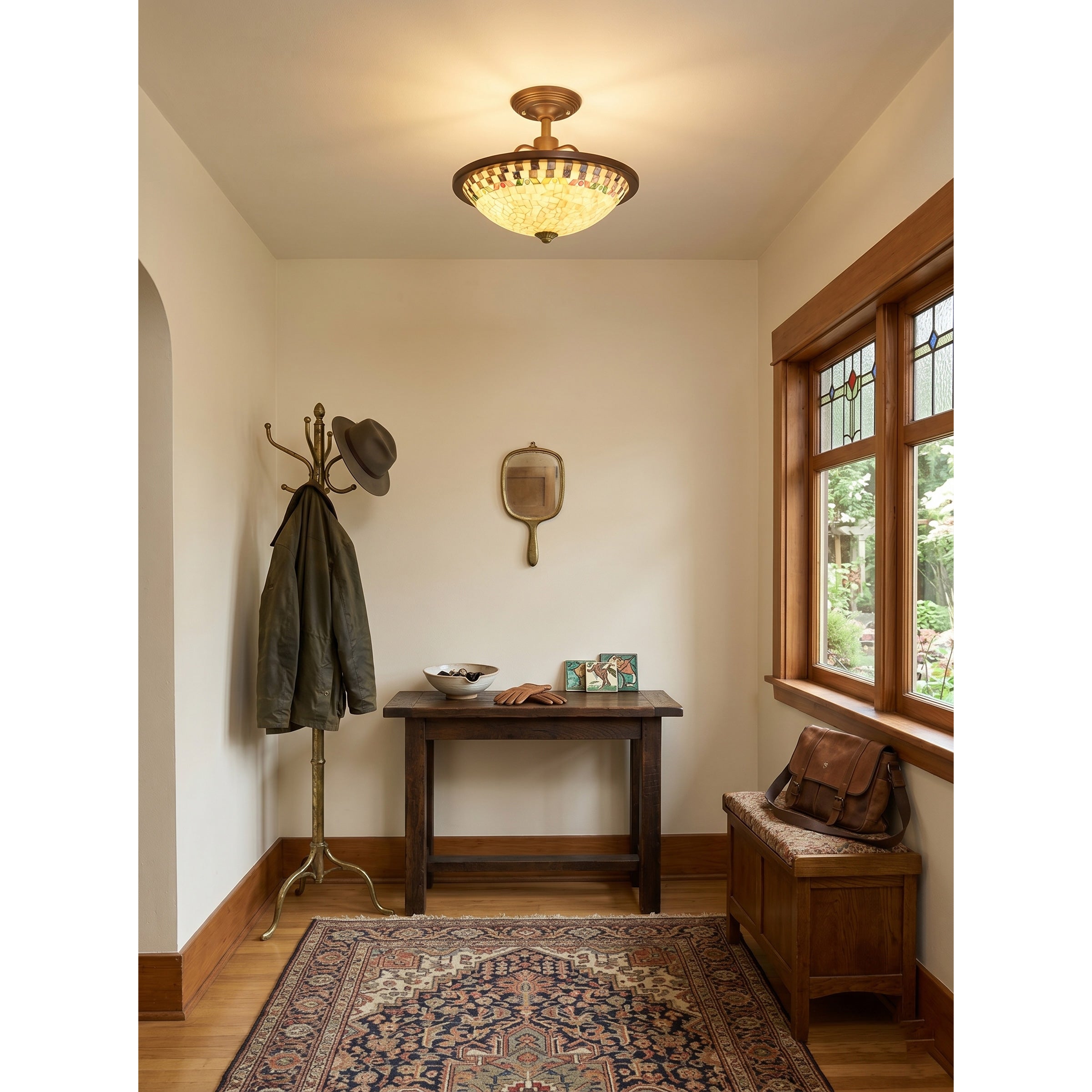 Angled view of the flush mount, highlighting the cream shell tiles and agate accents.