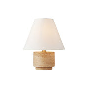 Bronte Table Lamp with a travertine base and flared linen shade.
