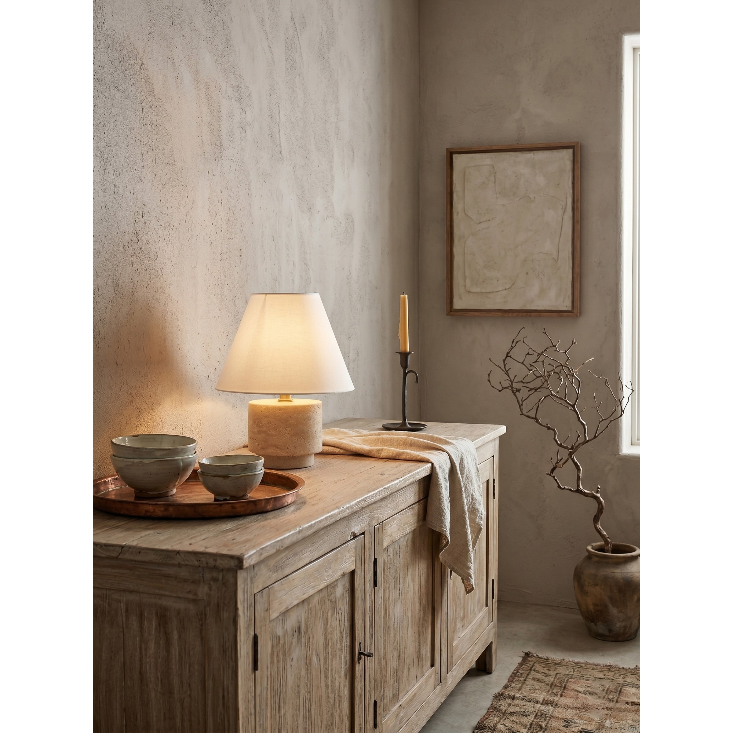 The lamp in a sophisticated entryway setting.
