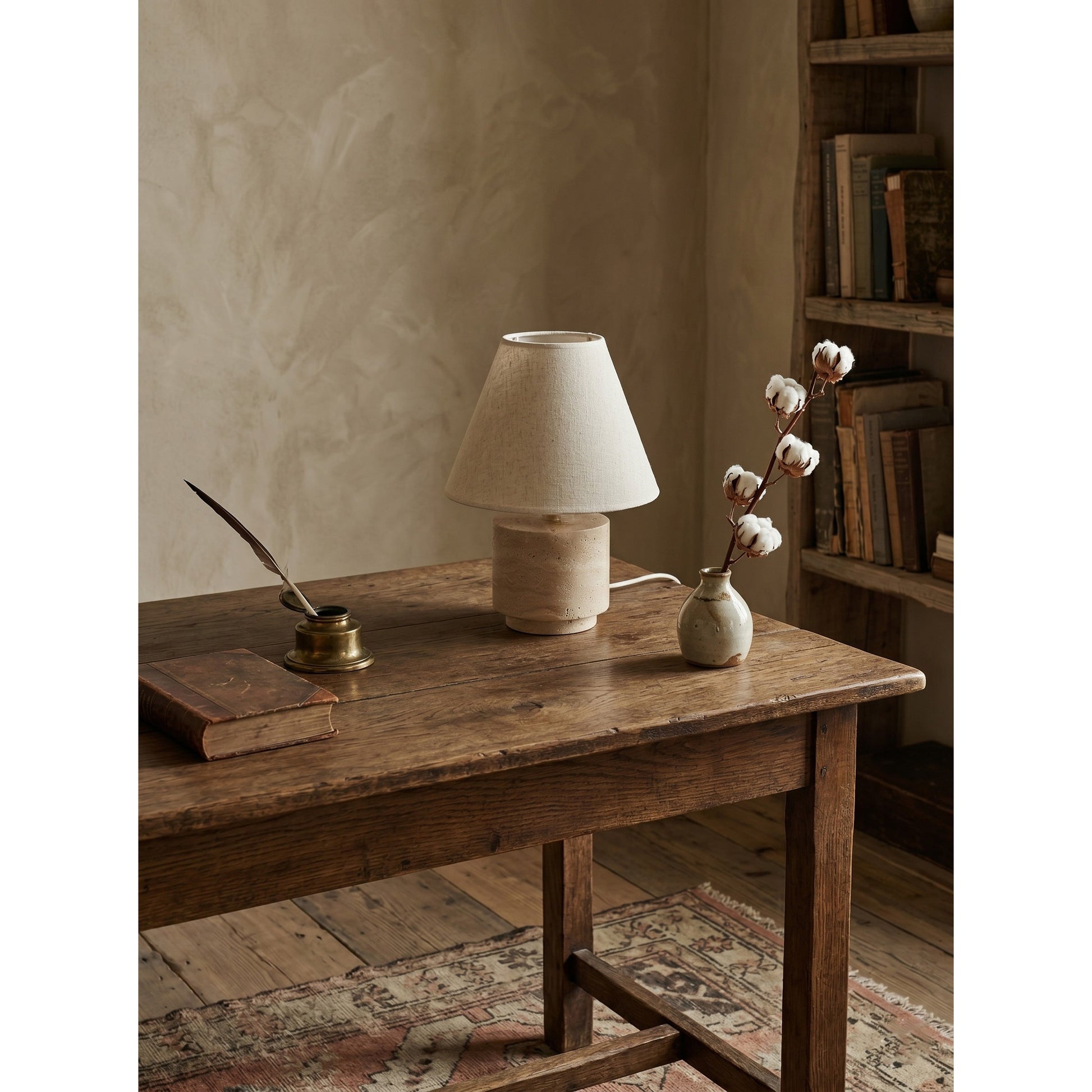 The lamp displayed on a minimalist bedroom nightstand.