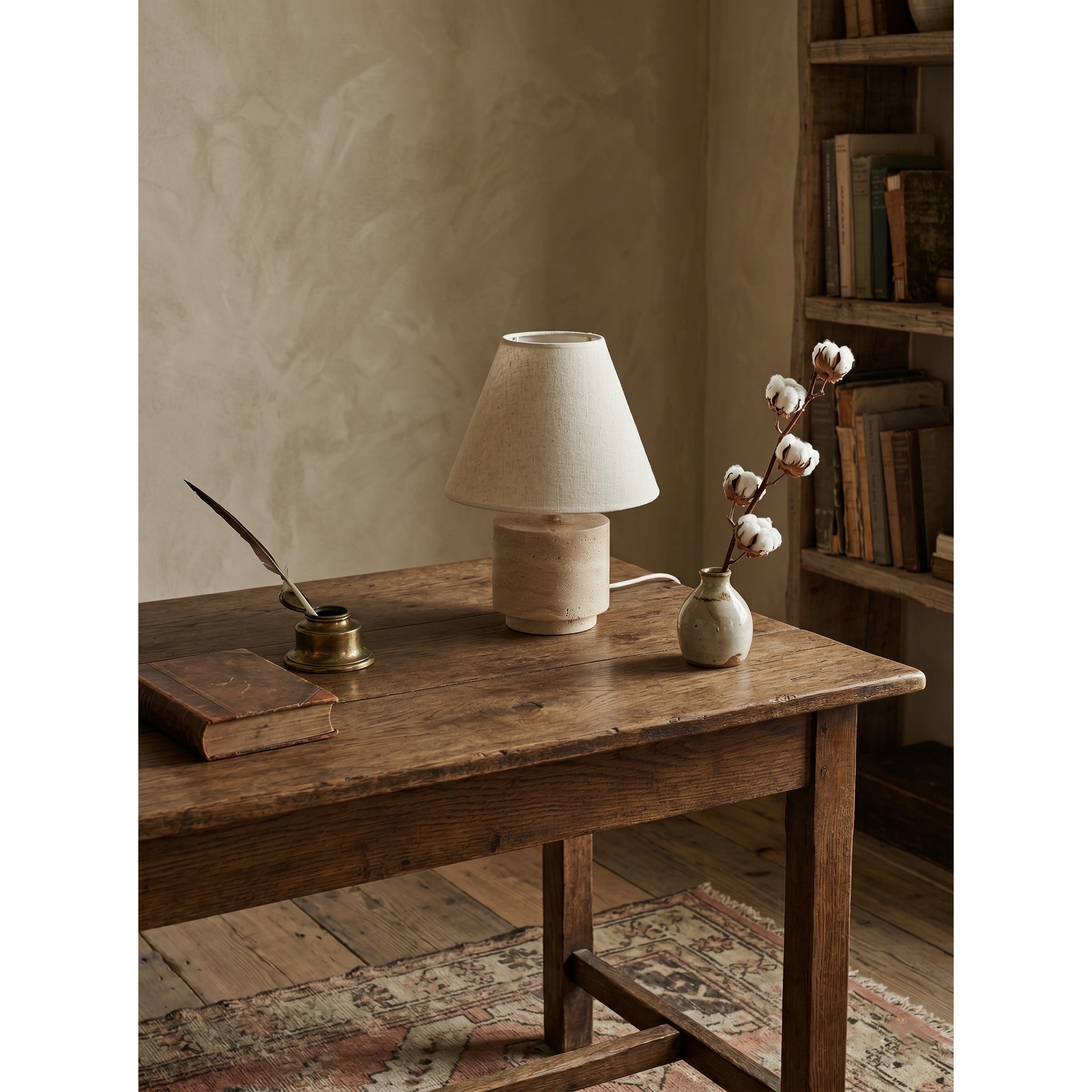 The lamp displayed on a minimalist bedroom nightstand.