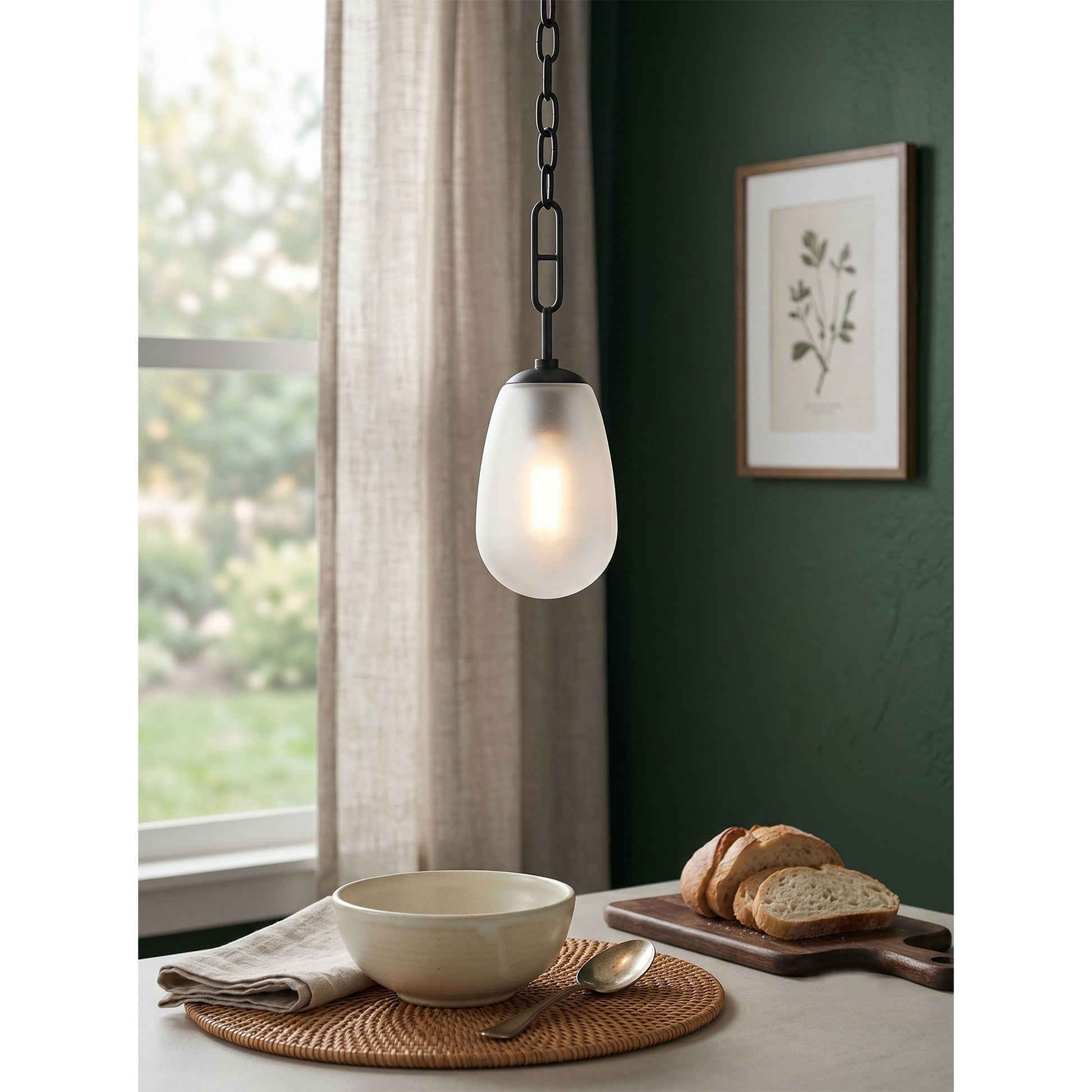 The organic, modern silhouette of the Bruckner Pendant Lamp against a neutral wall.