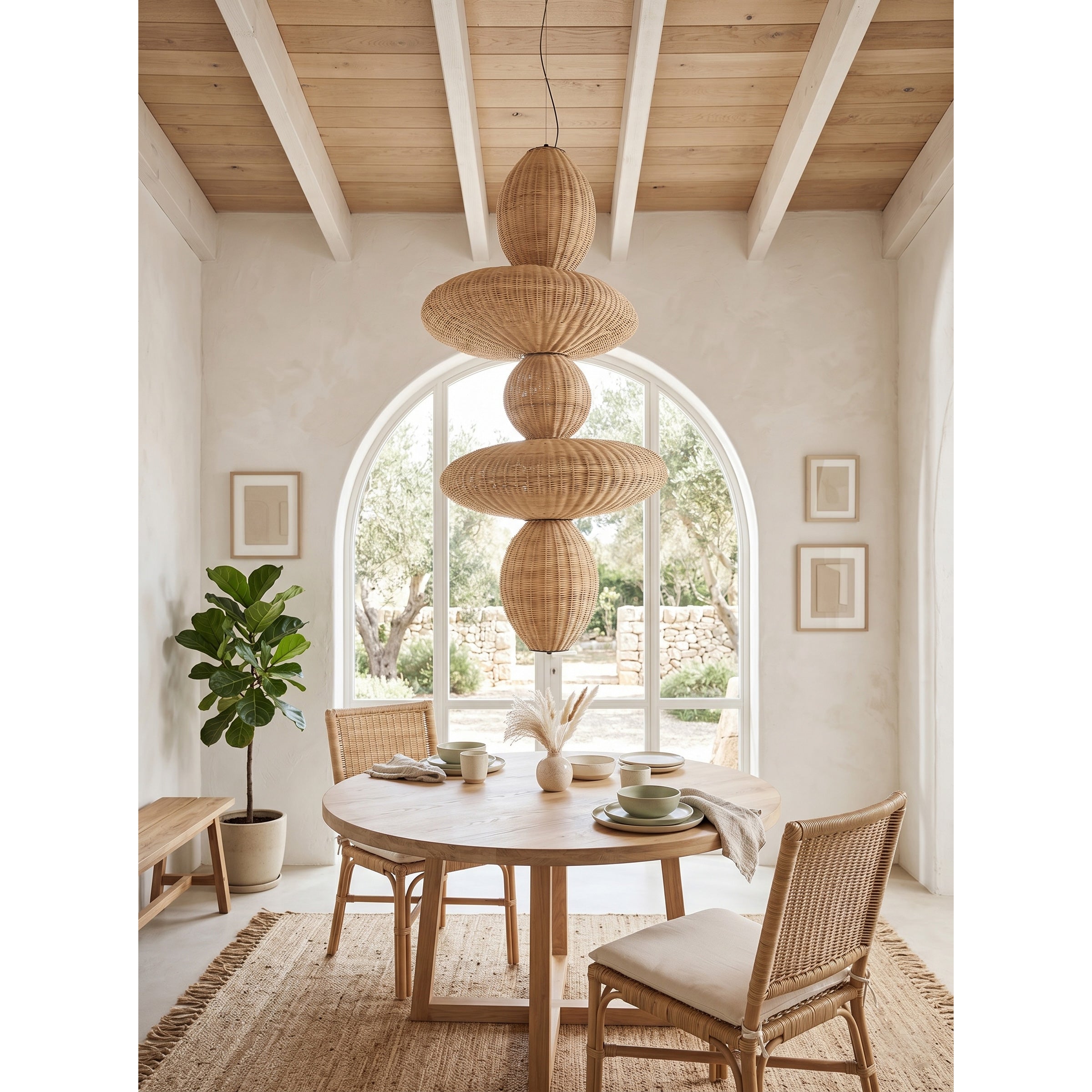 The chandelier featured in a coastal-themed living room with light, airy decor.