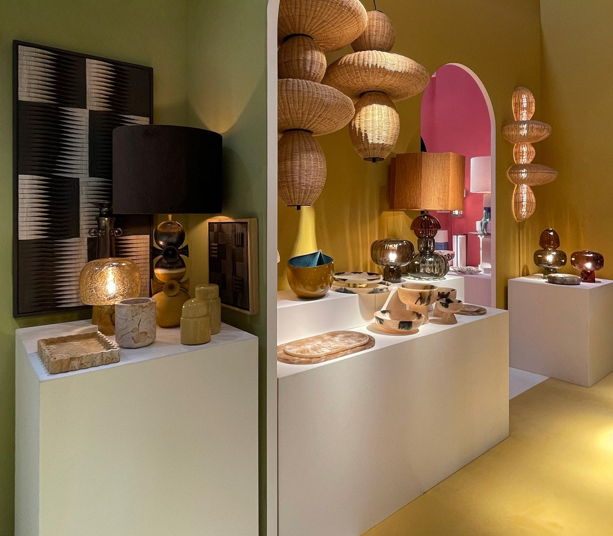 Bubbles Rattan Chandelier hanging as a statement piece in a high-ceiling entryway.