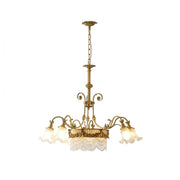 Camille Fringed Chandelier with aged-brass finish and frosted glass shades.