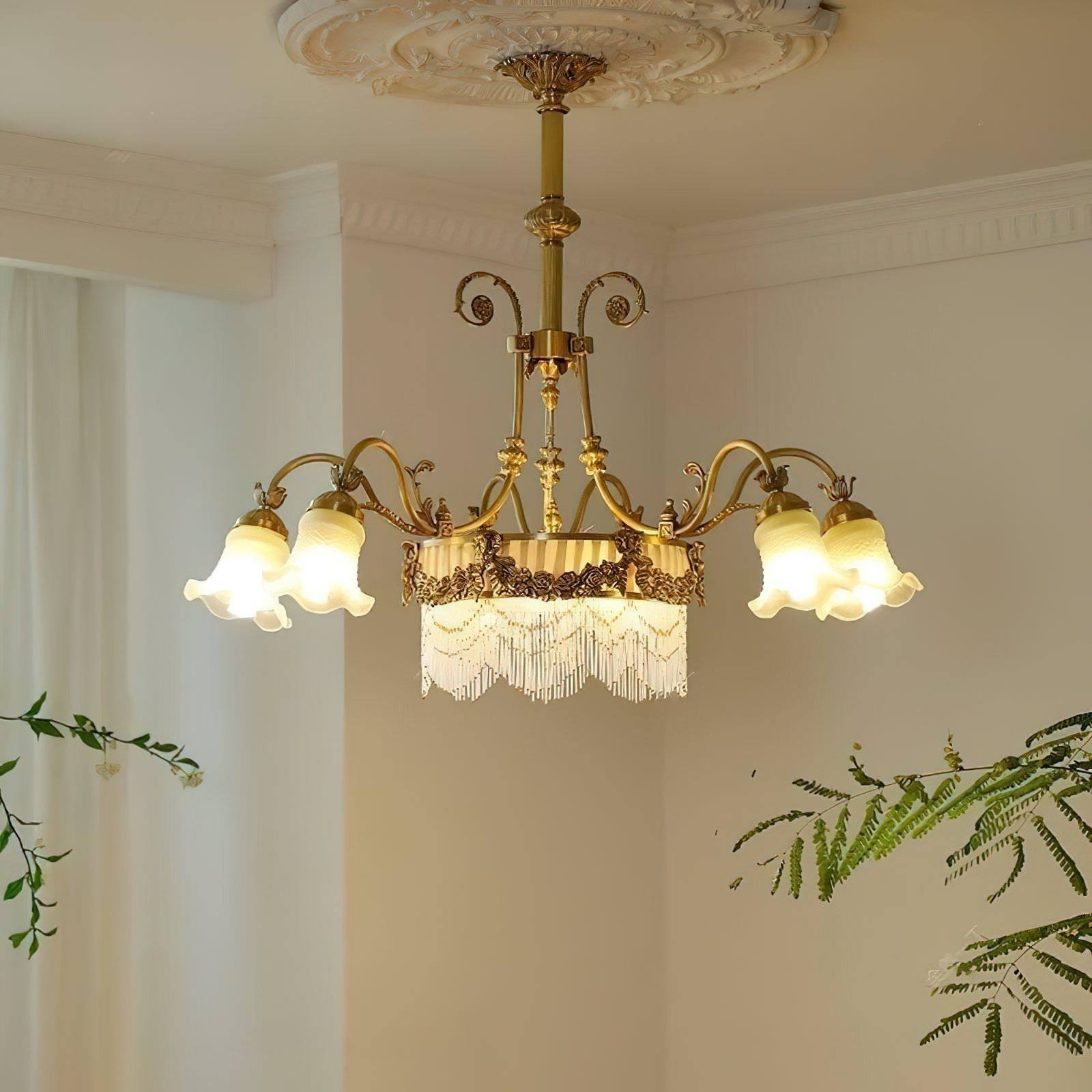 The Camille Chandelier illuminated, casting a soft and dreamy glow.