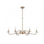 Candler Chandelier in brass finish with white fabric shades.