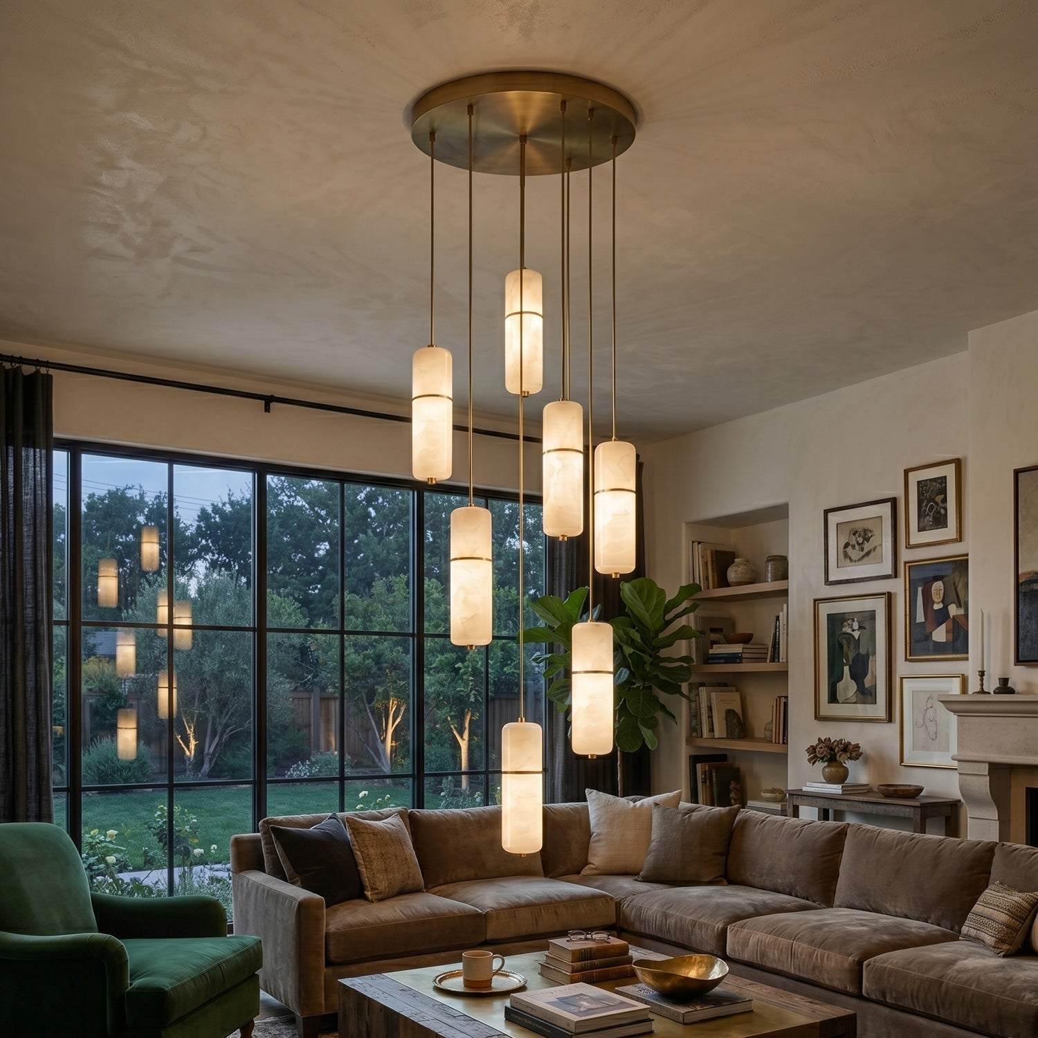 The Cannula Alabaster Chandelier in a contemporary living room with high ceilings.