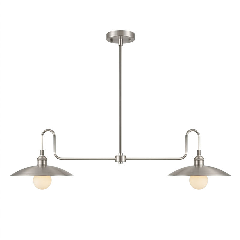 The two white glass globes of the chandelier, illuminated.
