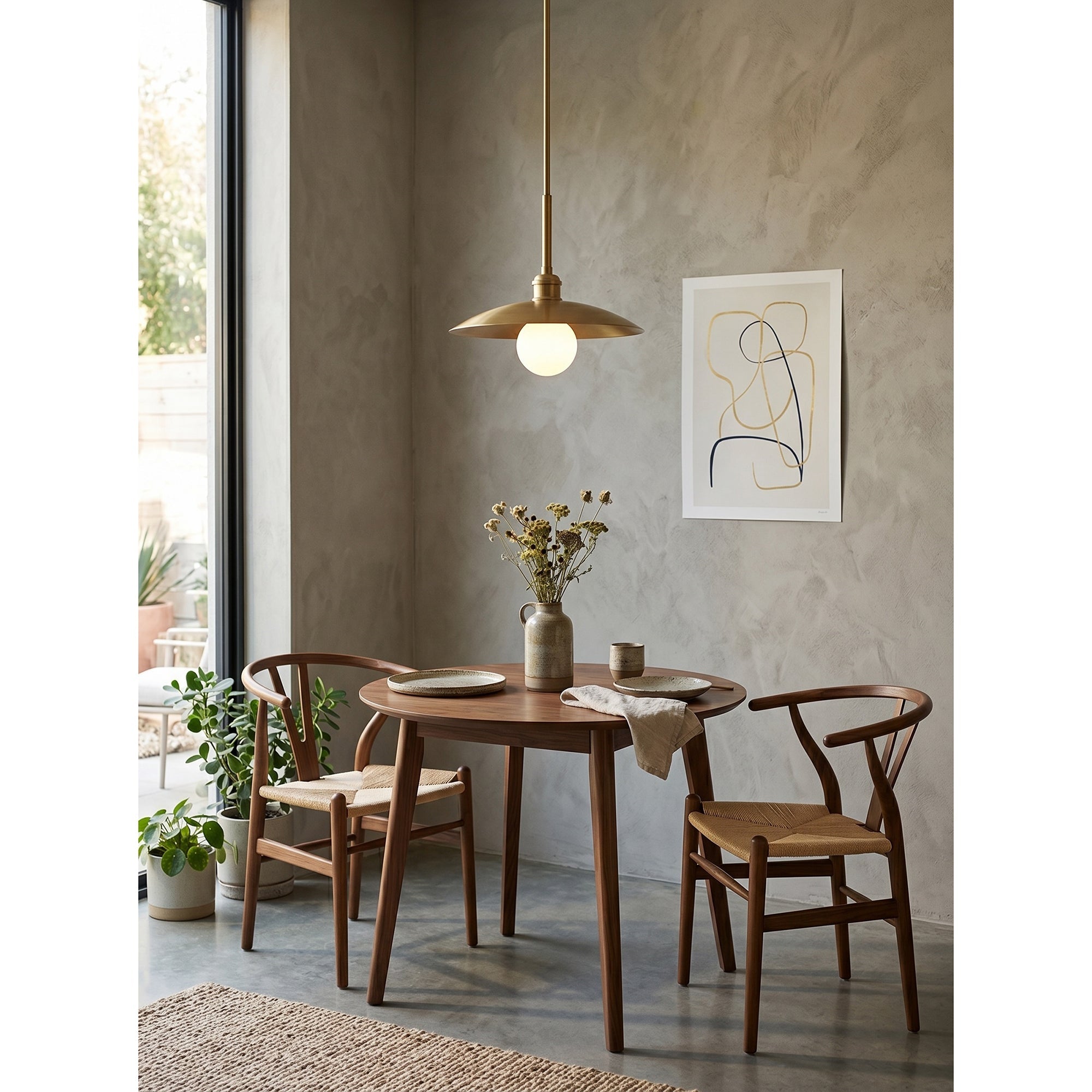 A pair of Cantina Pendant Lamps hanging over a modern kitchen island.