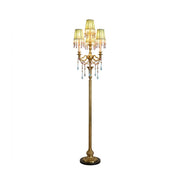 Carins Pleated Floor Lamp with green shades and crystal details in a living room setting.