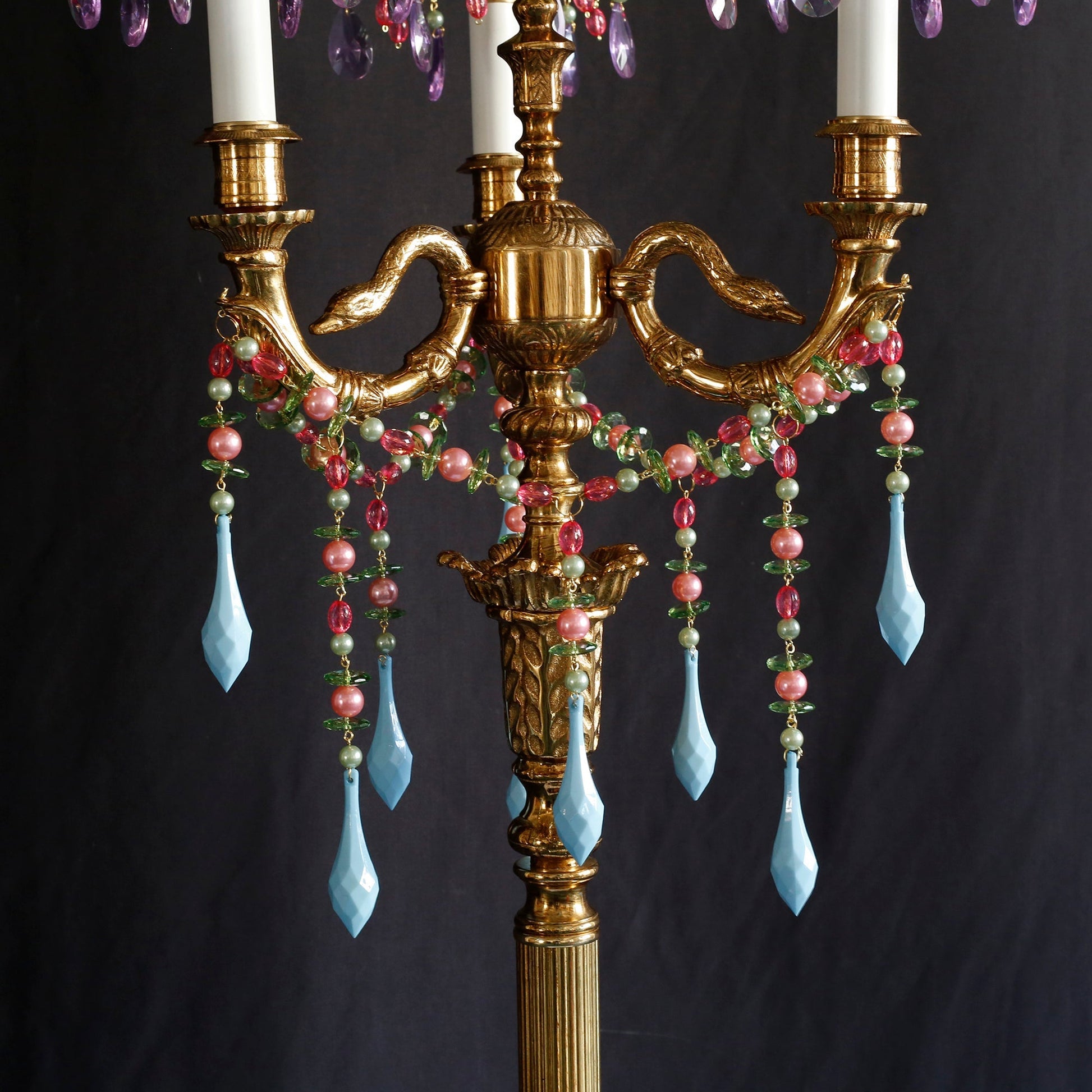 The Carins Floor Lamp styled in a primary suite with grandmillennial decor.