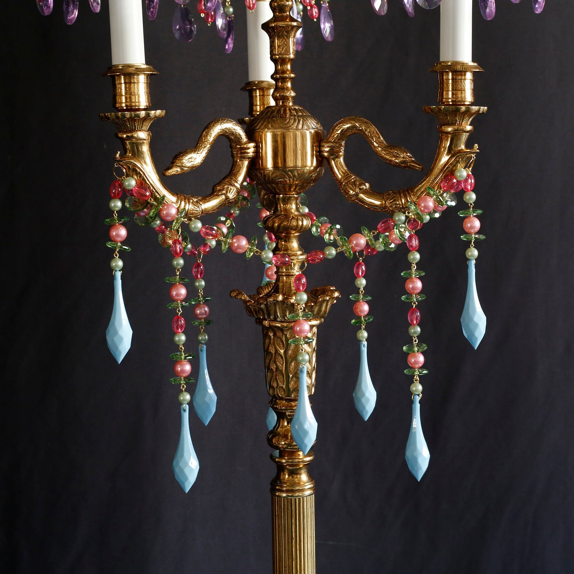 The Carins Floor Lamp styled in a primary suite with grandmillennial decor.