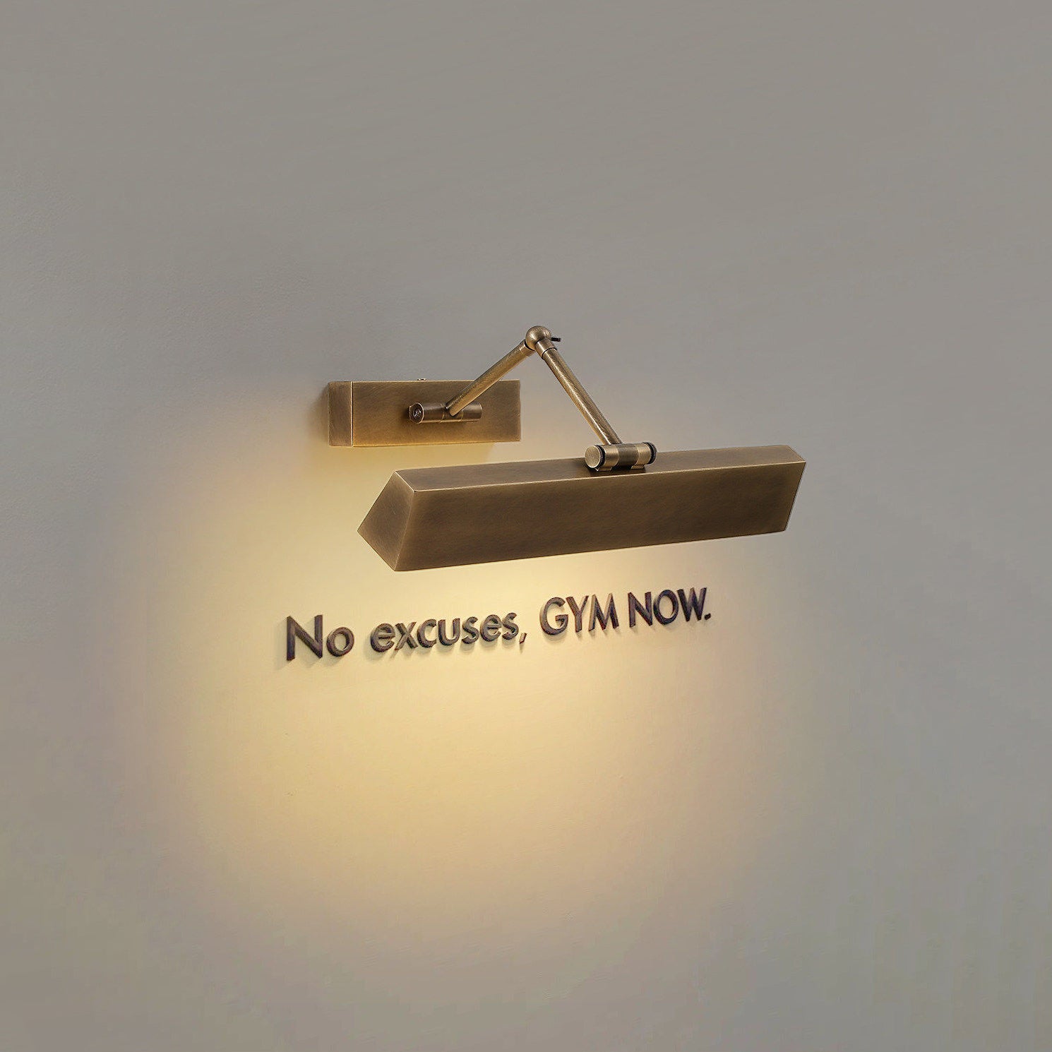 The sconce adjusted to its maximum extension from the wall.