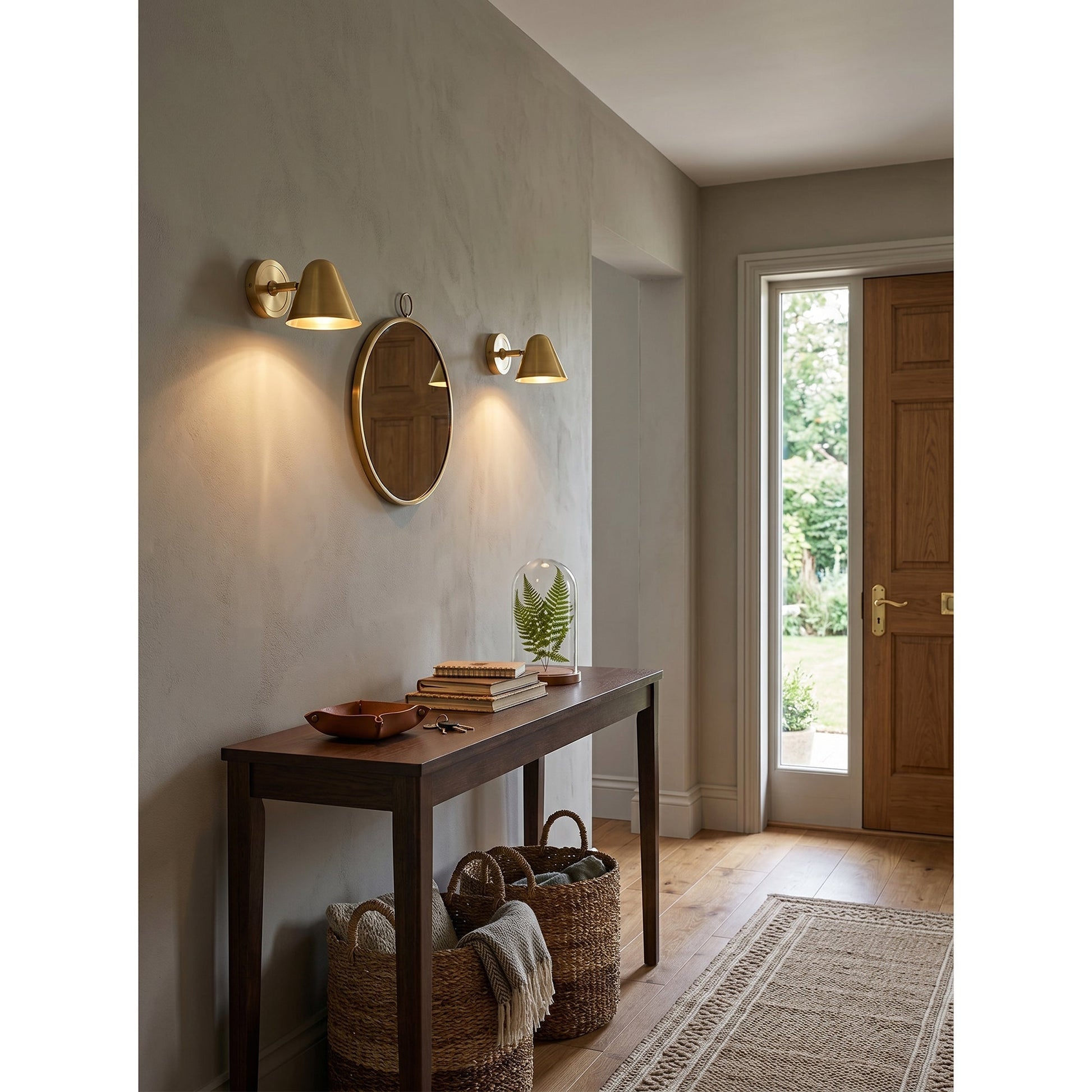 The sconce's shade adjusted to point directly downwards.