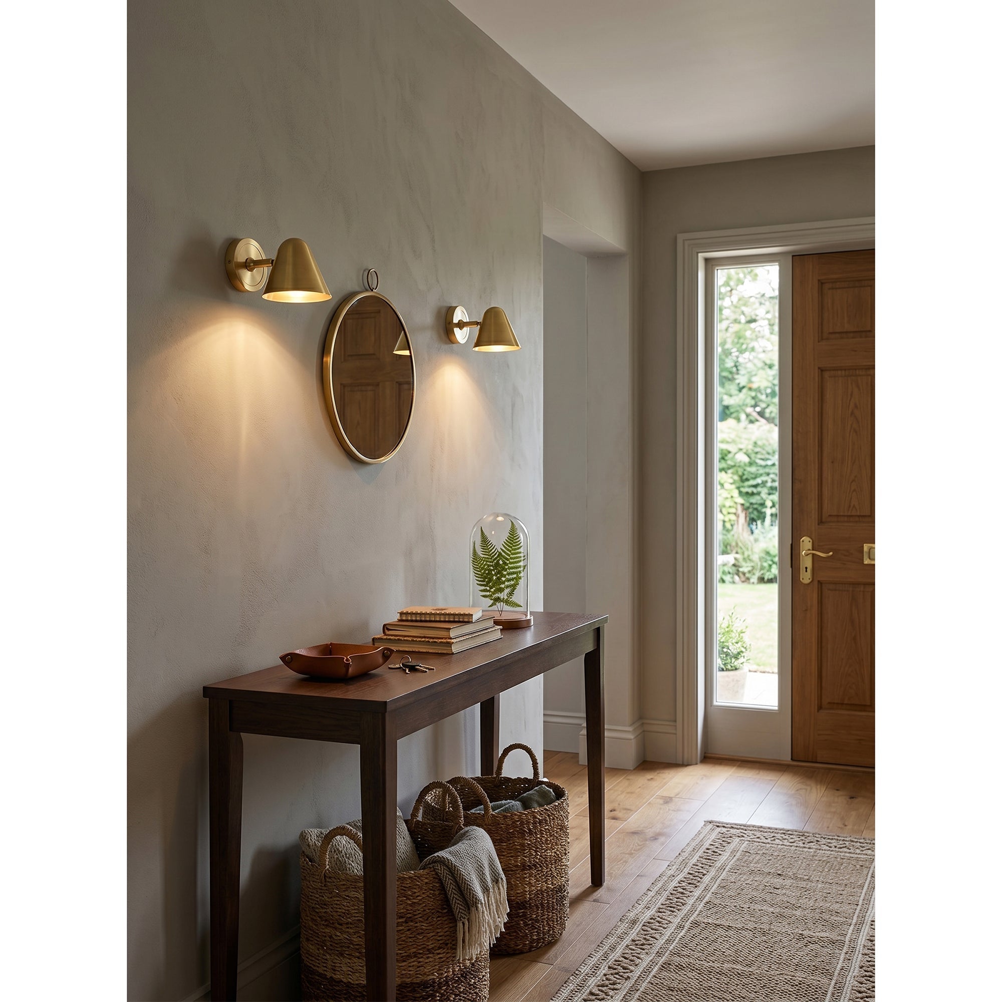 The sconce's shade adjusted to point directly downwards.