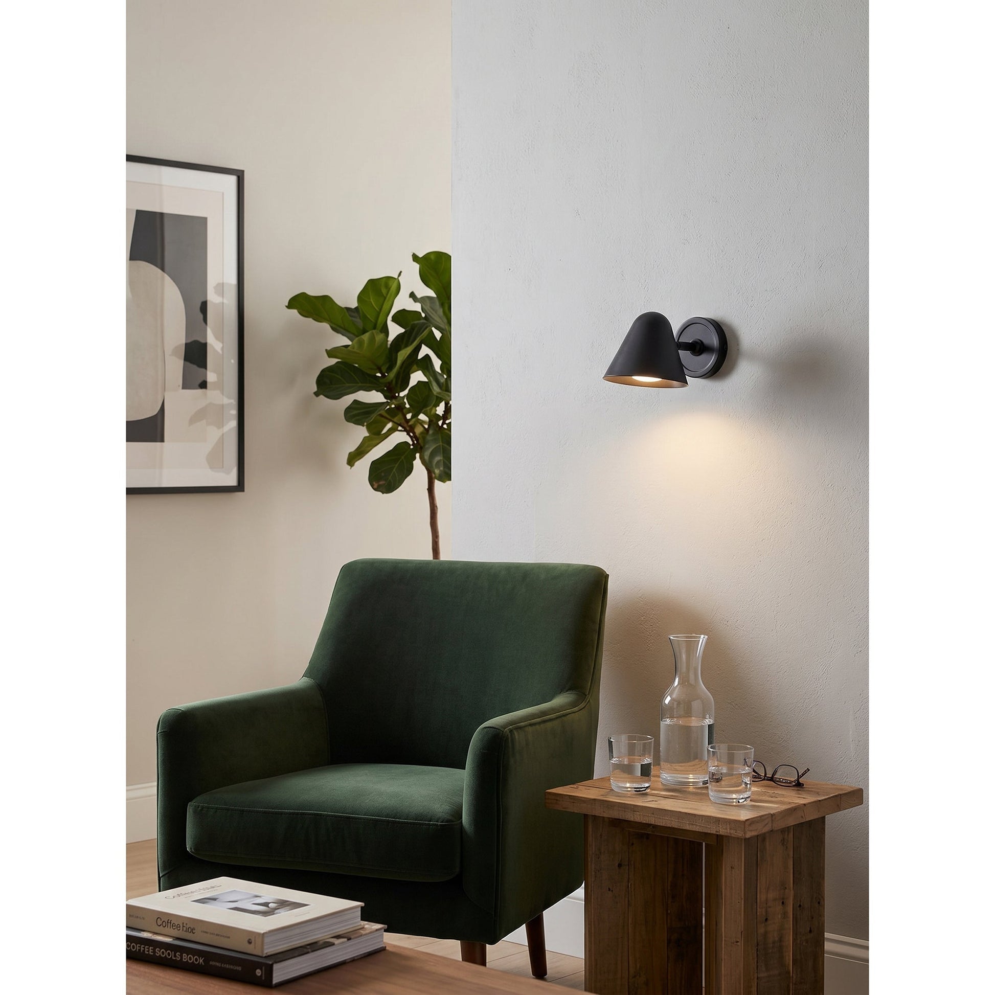 Front view of the Casa Cone Wall Sconce in antique brass.