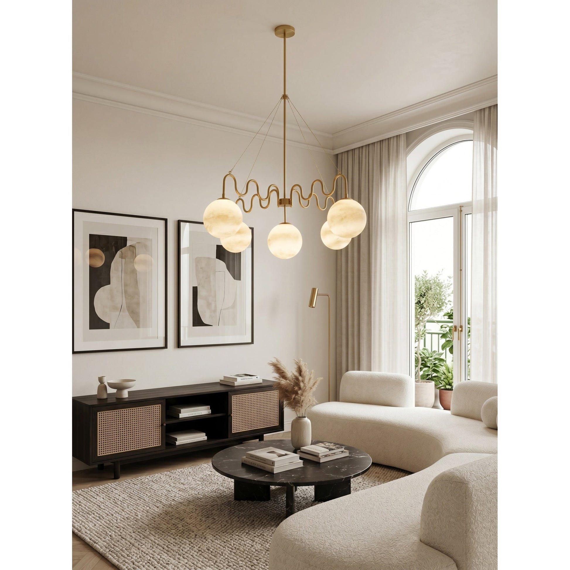 The Cecil Chandelier in brass finish, unlit, to show material detail.
