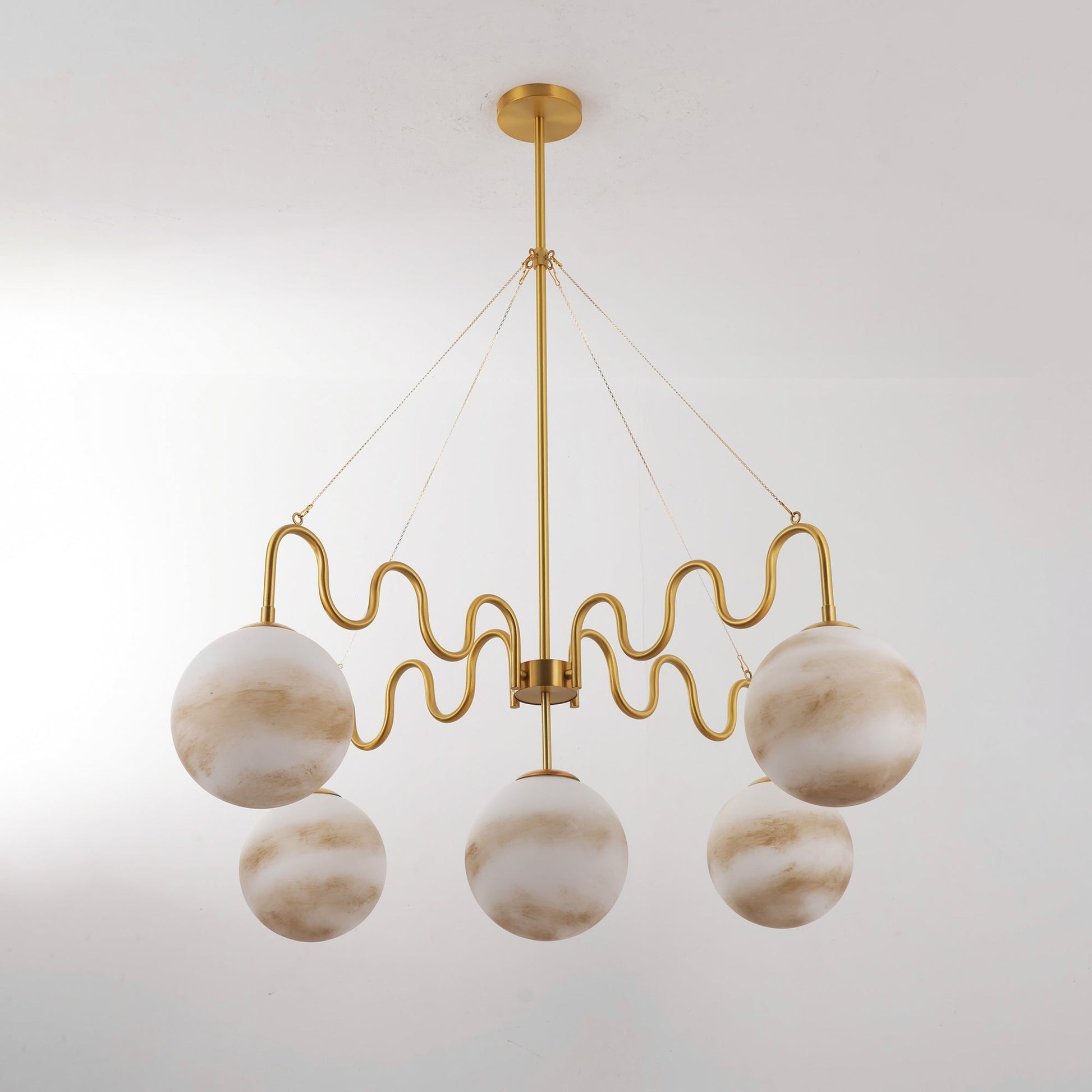 Studio shot of the full nickel chandelier on a white background.