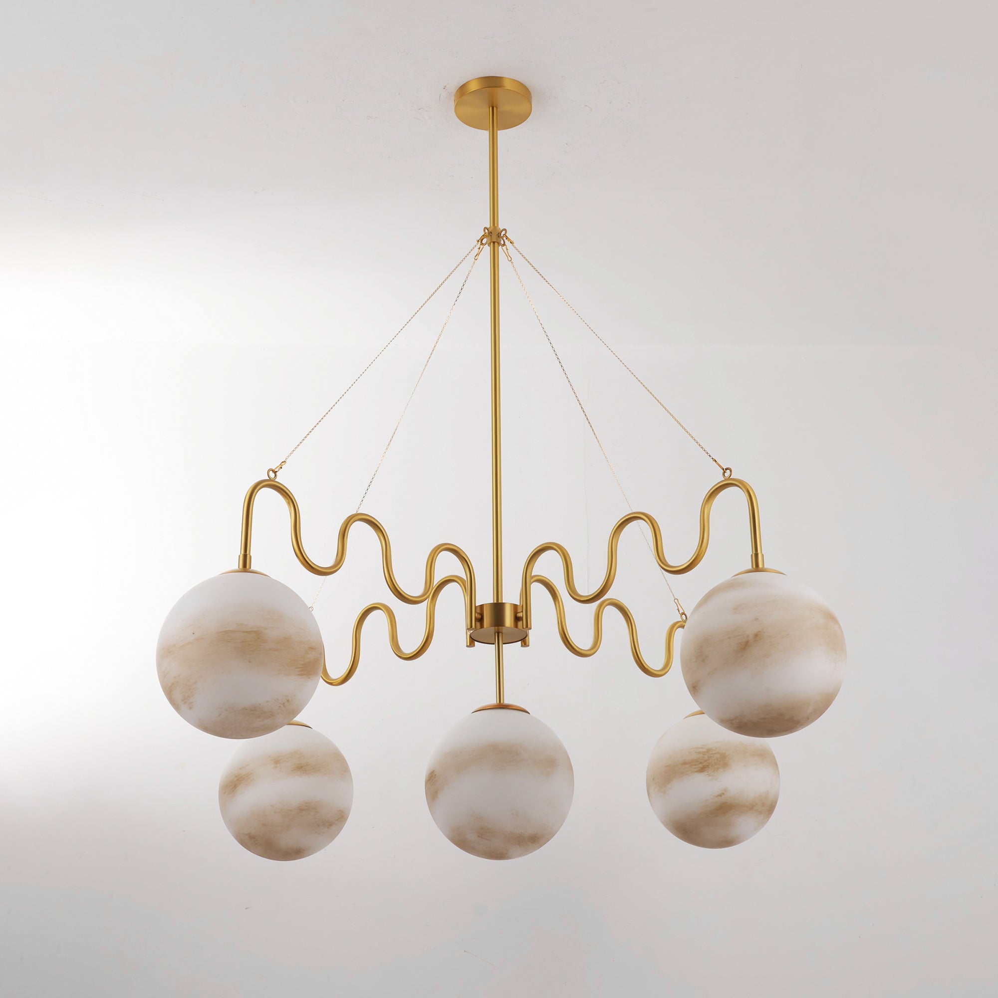 Studio shot of the full nickel chandelier on a white background.