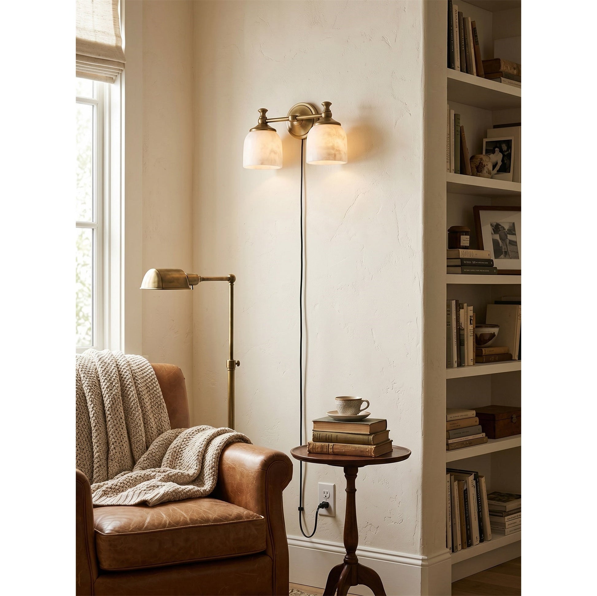 Front view of the double-head Chart Alabaster Wall Sconce in nickel.
