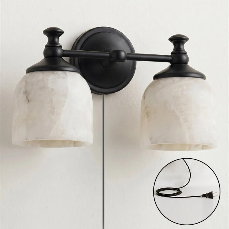 Angled view of the Chart Alabaster Wall Sconce in black finish.