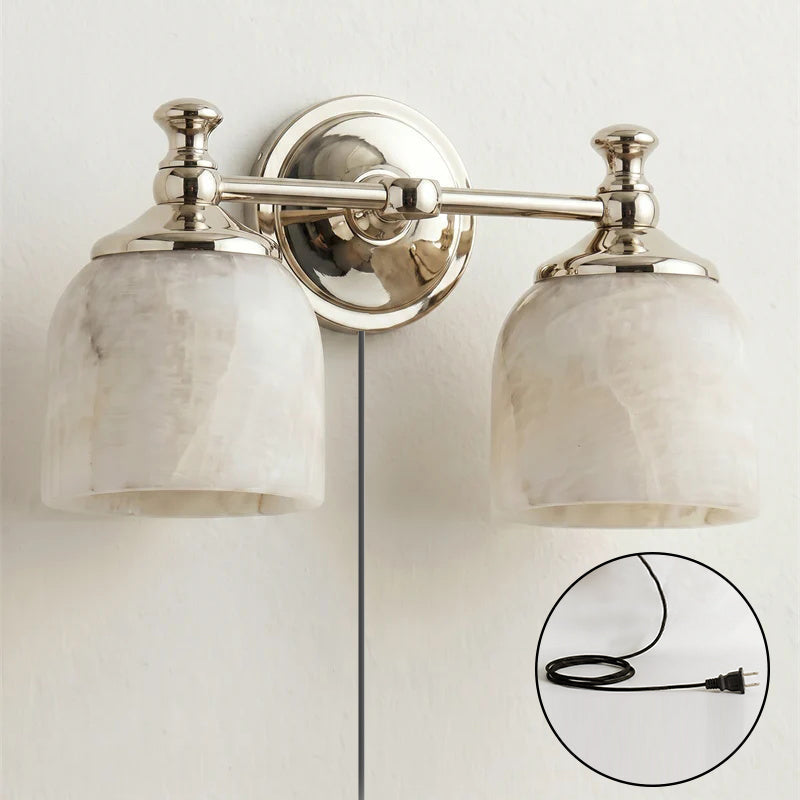 Angled view of the Chart Alabaster Wall Sconce in nickel finish.
