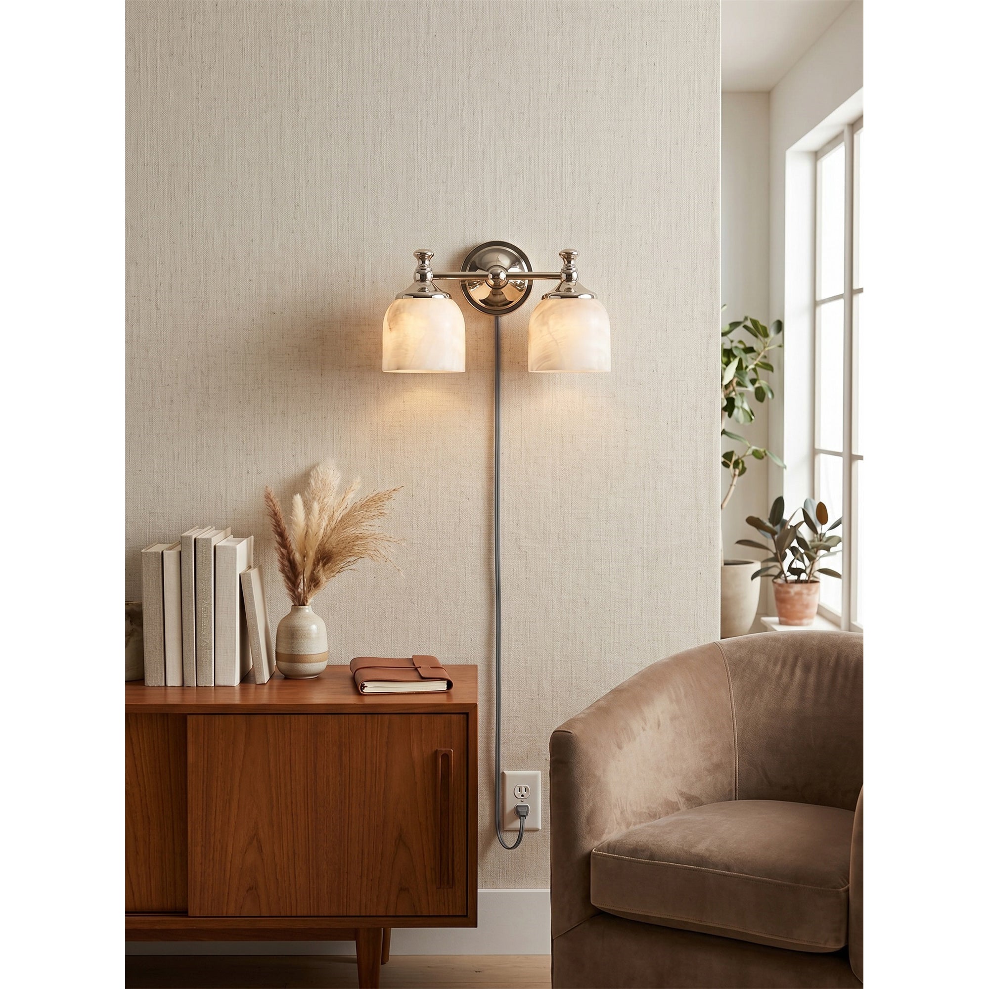 The fabric plug-in cord and switch detail of the Chart wall sconce.