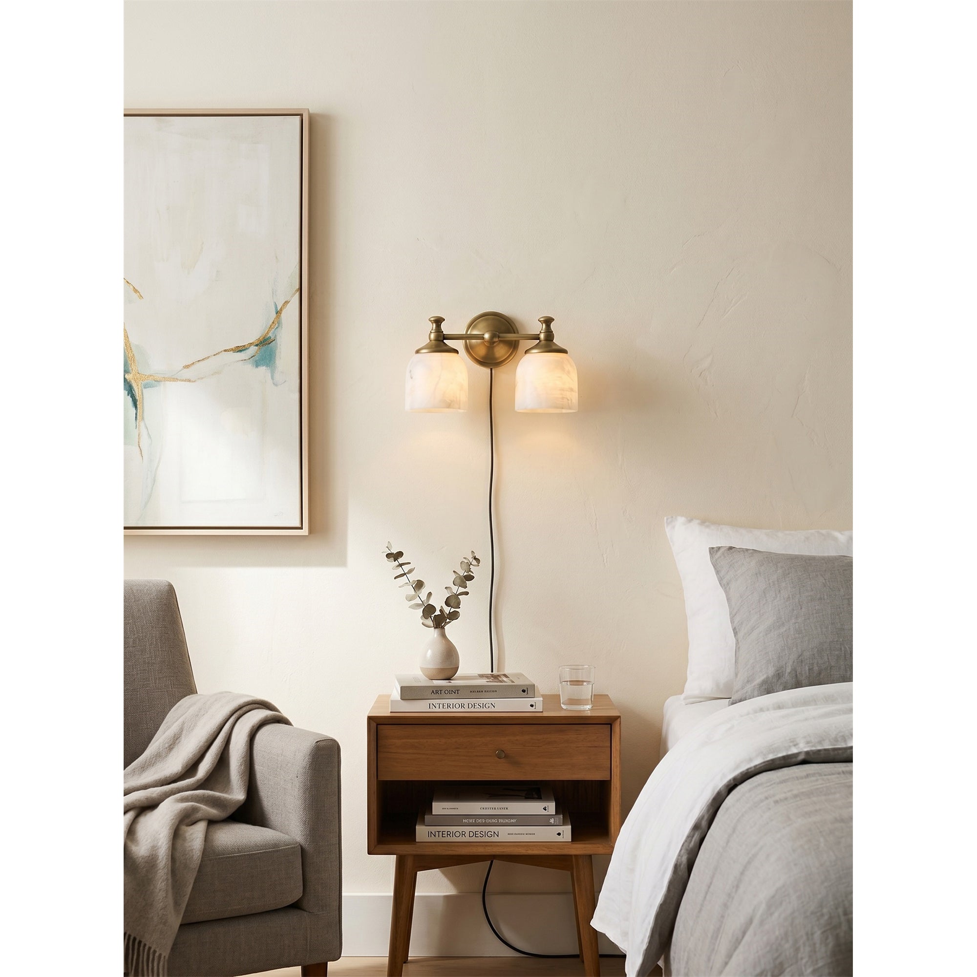 Front view of the double-head Chart Alabaster Wall Sconce in brass.