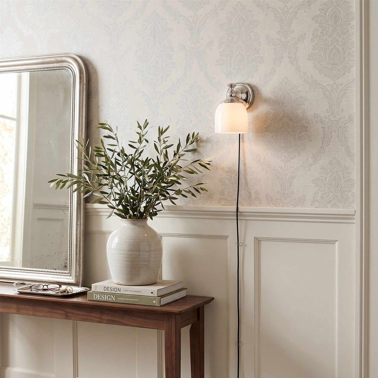 Close-up of the white glass shade on the Chart wall sconce.