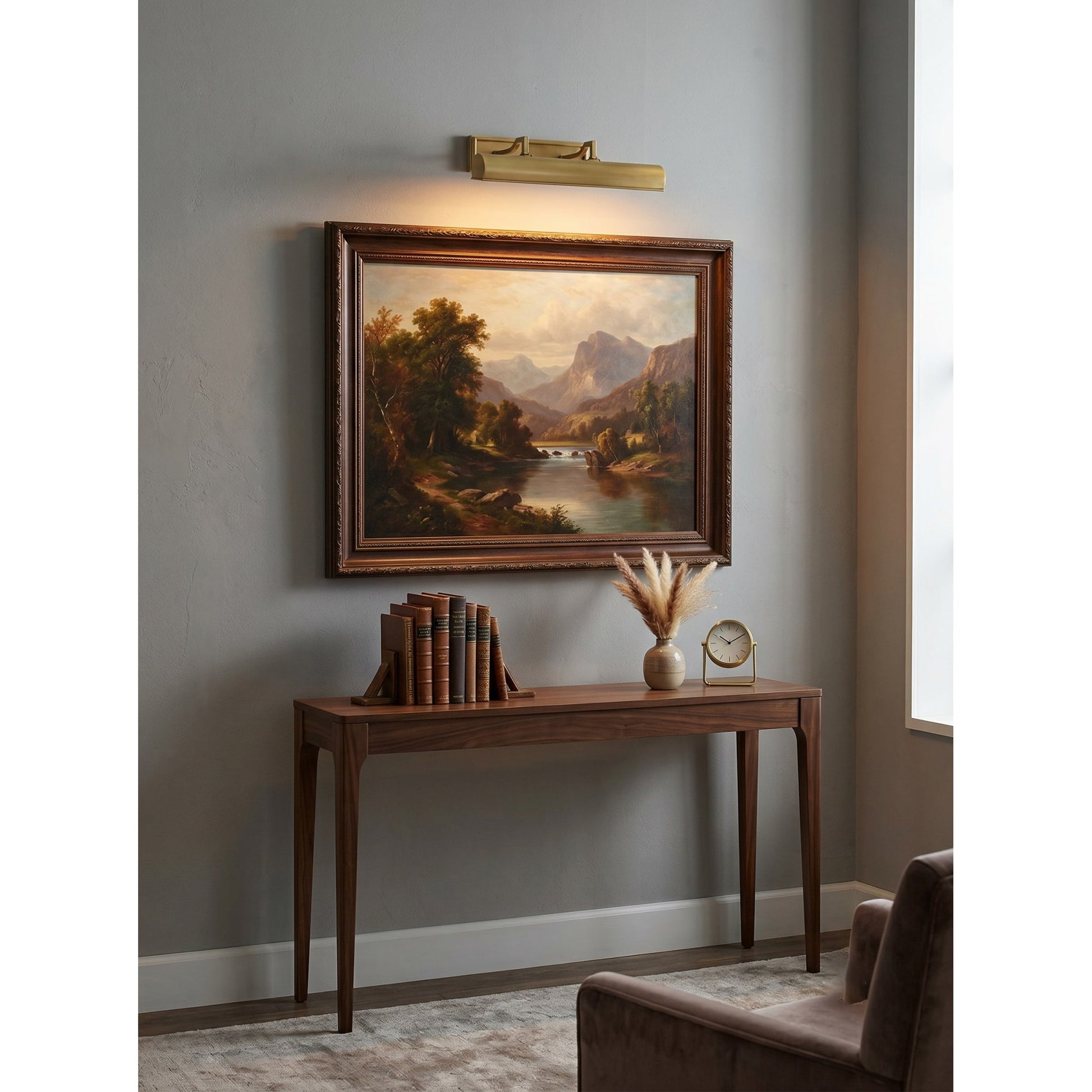 Front view of the 3-head Chawton Sconce in brass.
